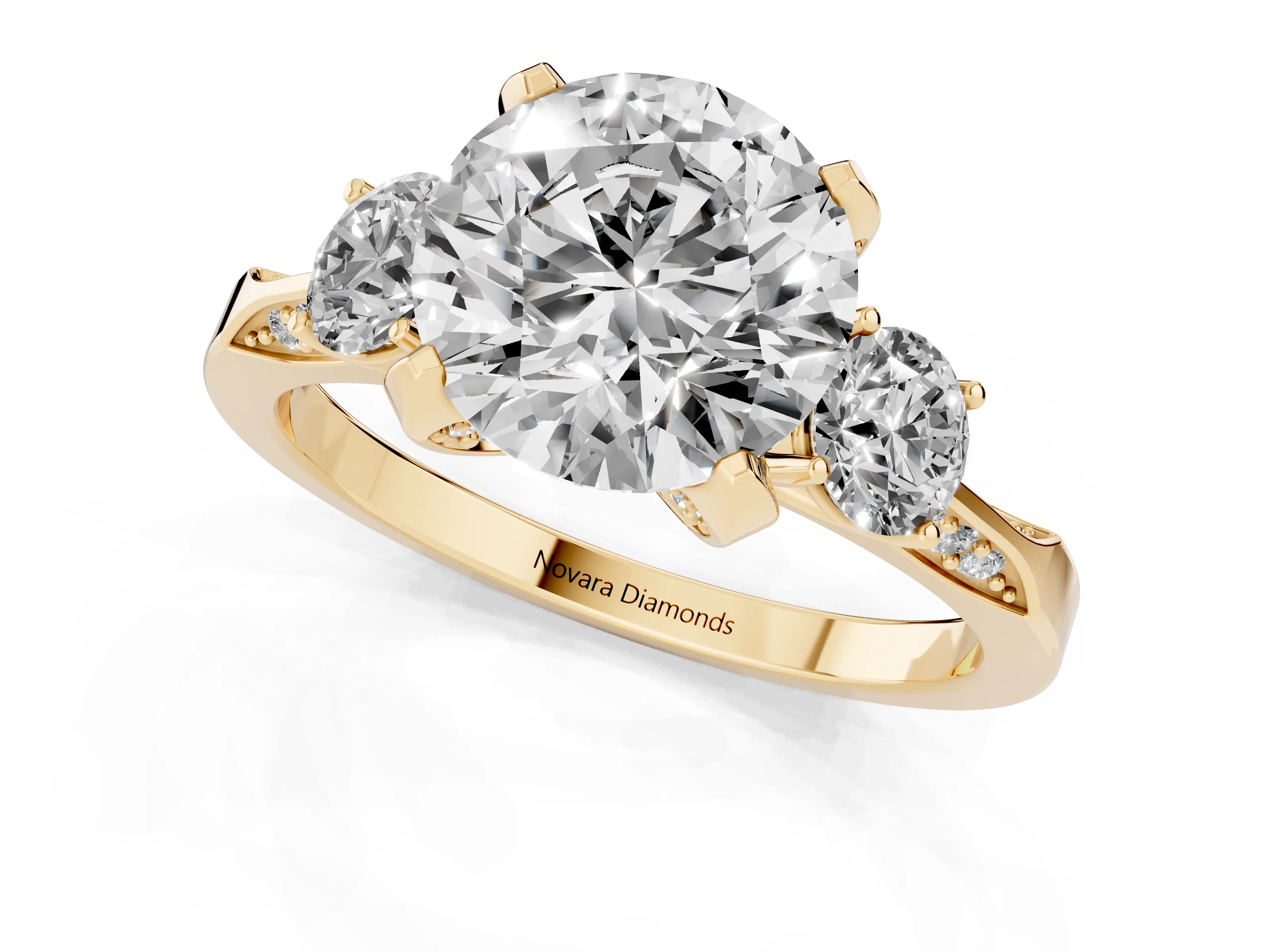 Round Cut Diamond Three-Stone Ring Set in Yellow gold with Pavé Band and Smaller Side Stones