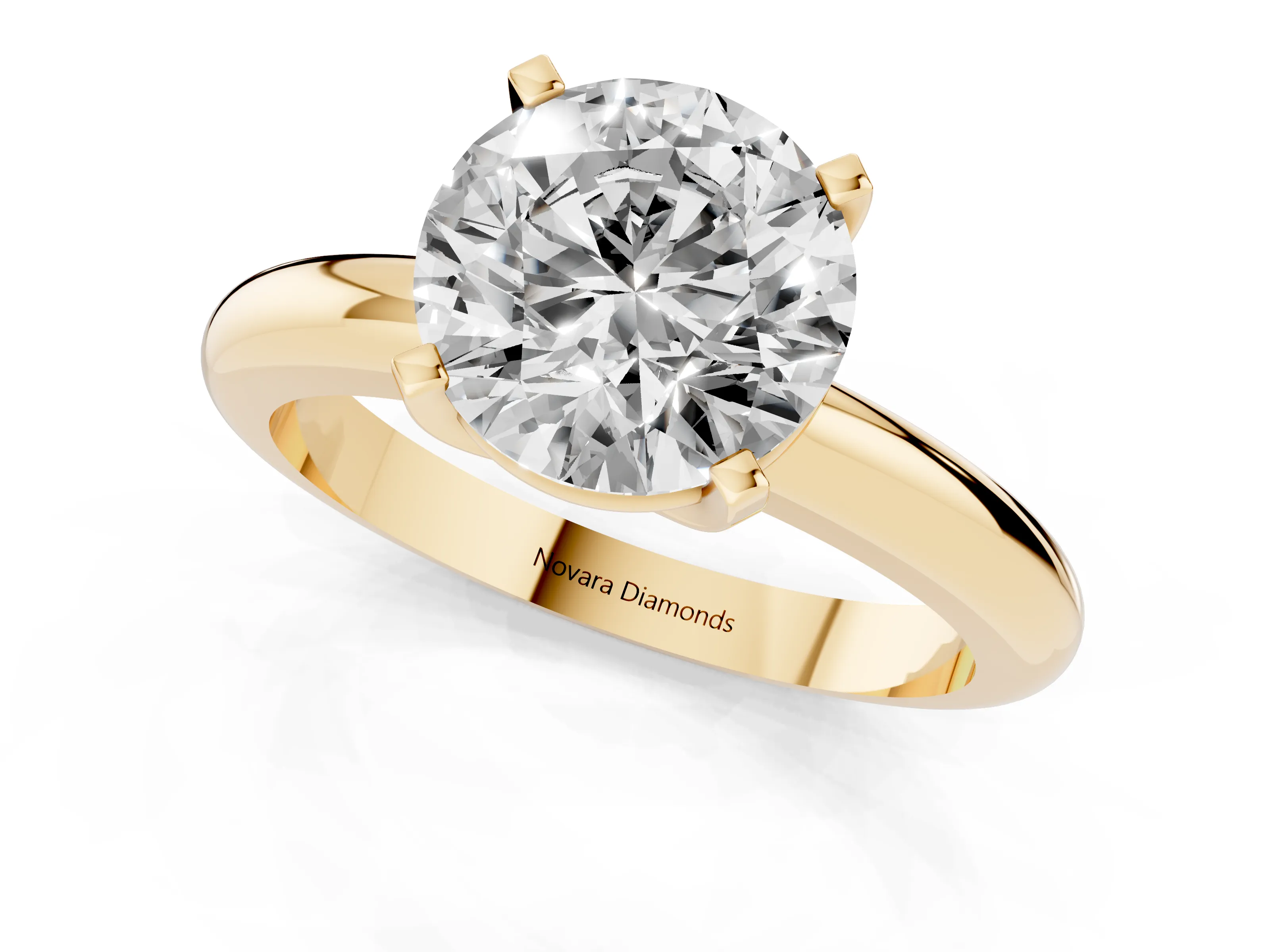 Round Cut Diamond Solitaire Engagement Ring Set in Yellow gold with Round Band and Prong Setting