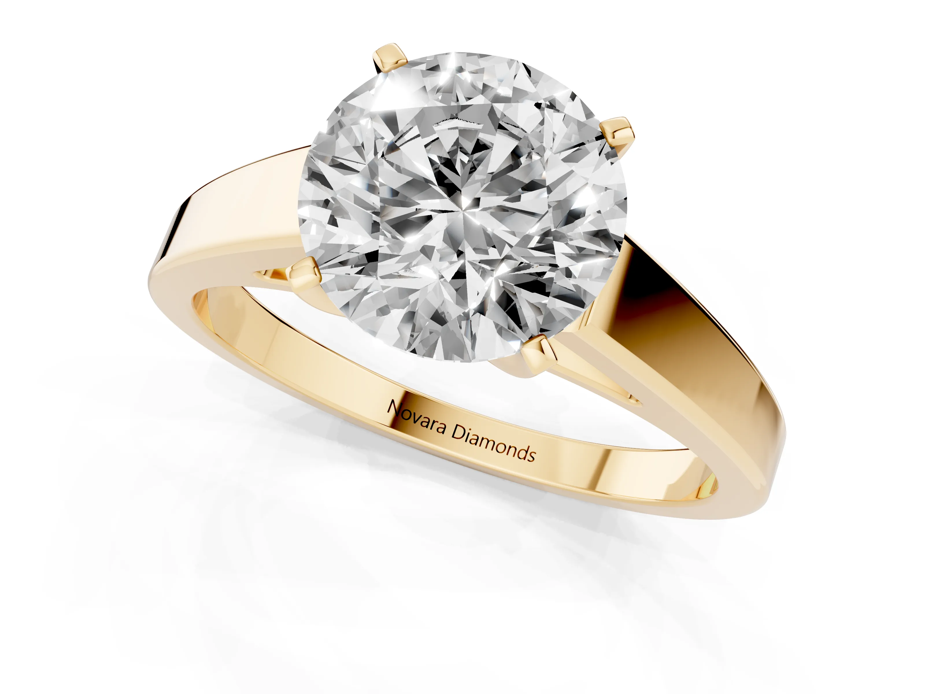 Round Cut Diamond Solitaire Engagement Ring Set in Yellow gold with Prong Setting and Tapered Band