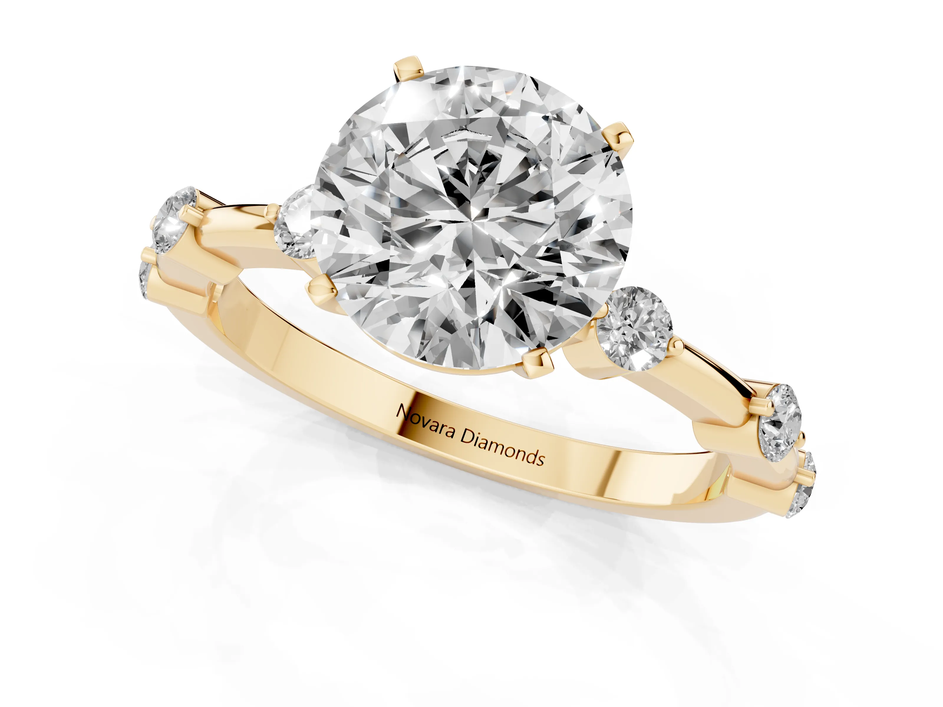 Round Cut Diamond Solitaire Ring Set in Yellow gold with Bezel Set Side Stones and Prong Setting