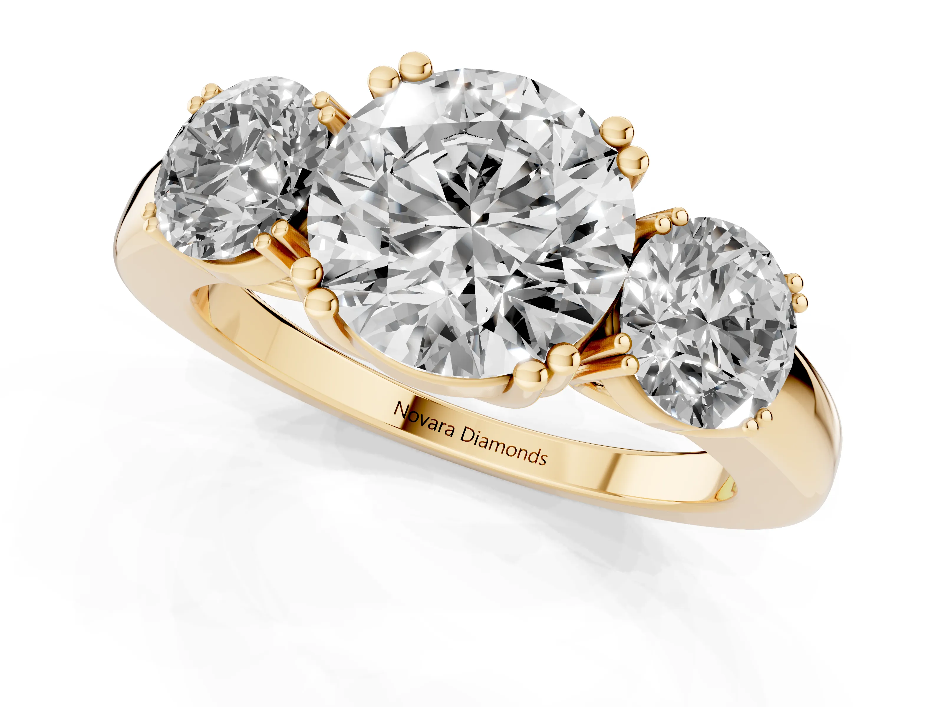 Round Cut Diamond Three-Stone Ring Set in Yellow gold with Polished Channel-Set Band