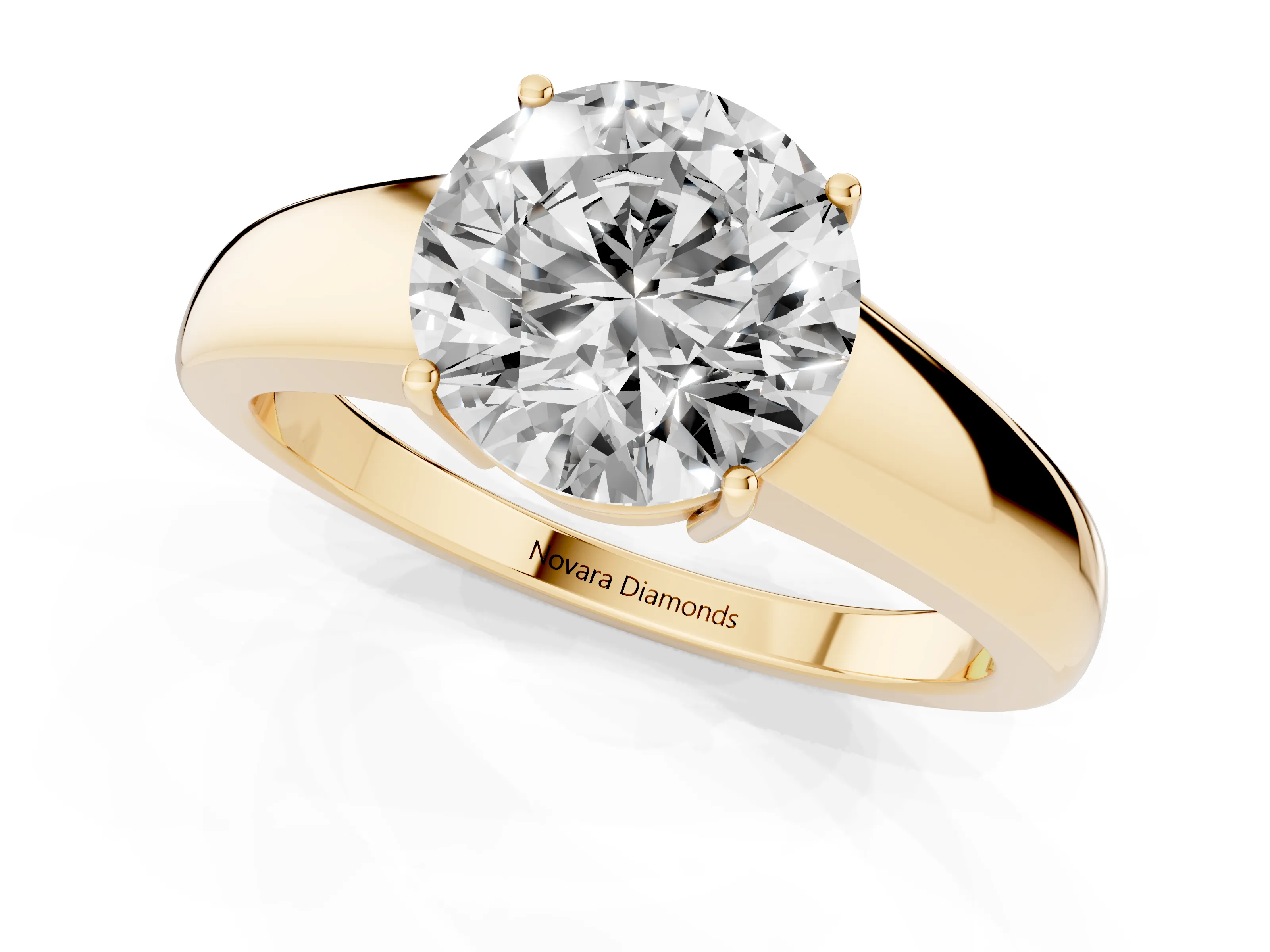 Round Cut Diamond Solitaire Ring Set in Yellow gold with Tapered Band and Prong Setting