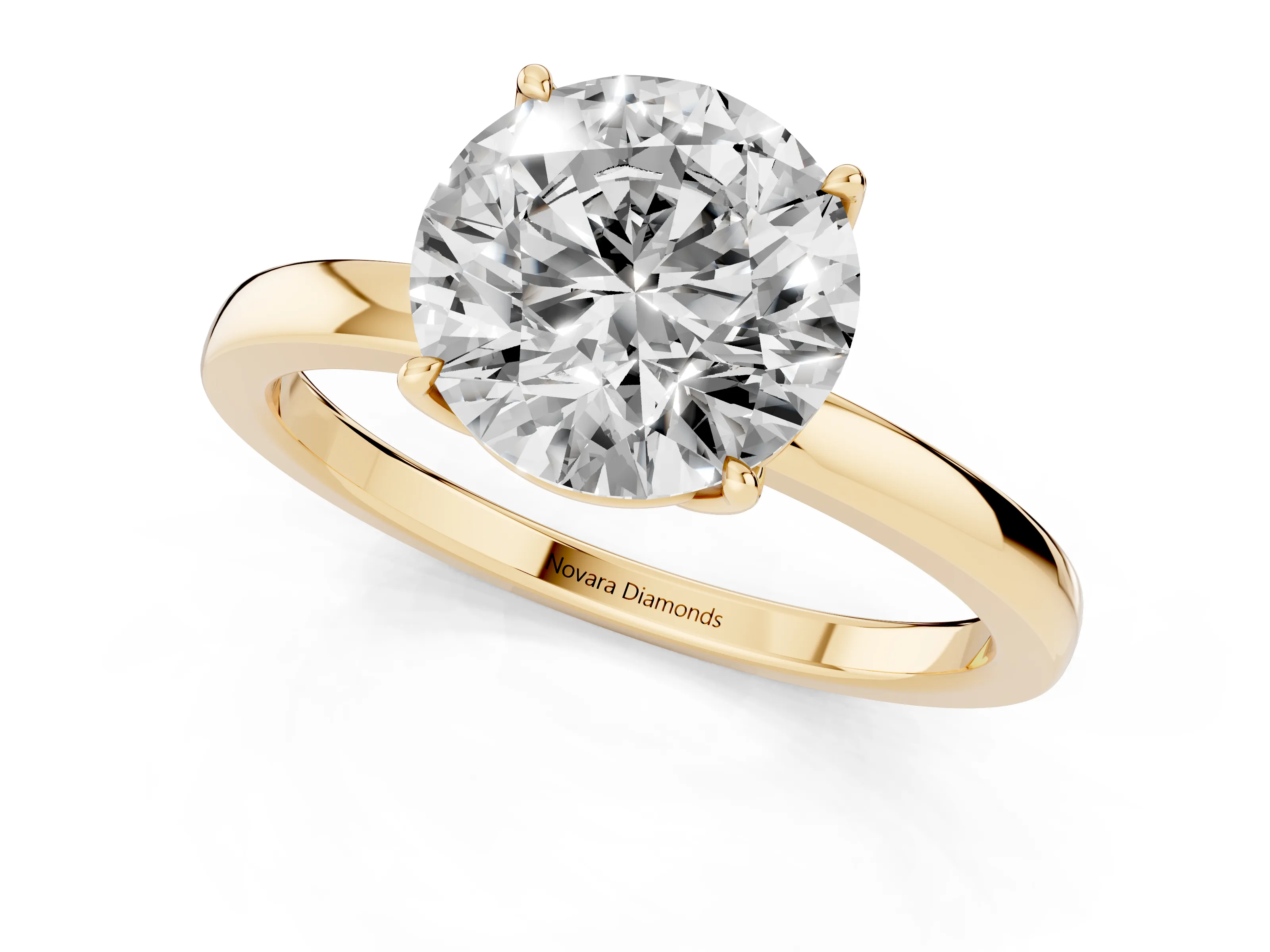 Round Cut Diamond Solitaire Ring Set in Yellow gold with Prong Setting and Thin Polished Band
