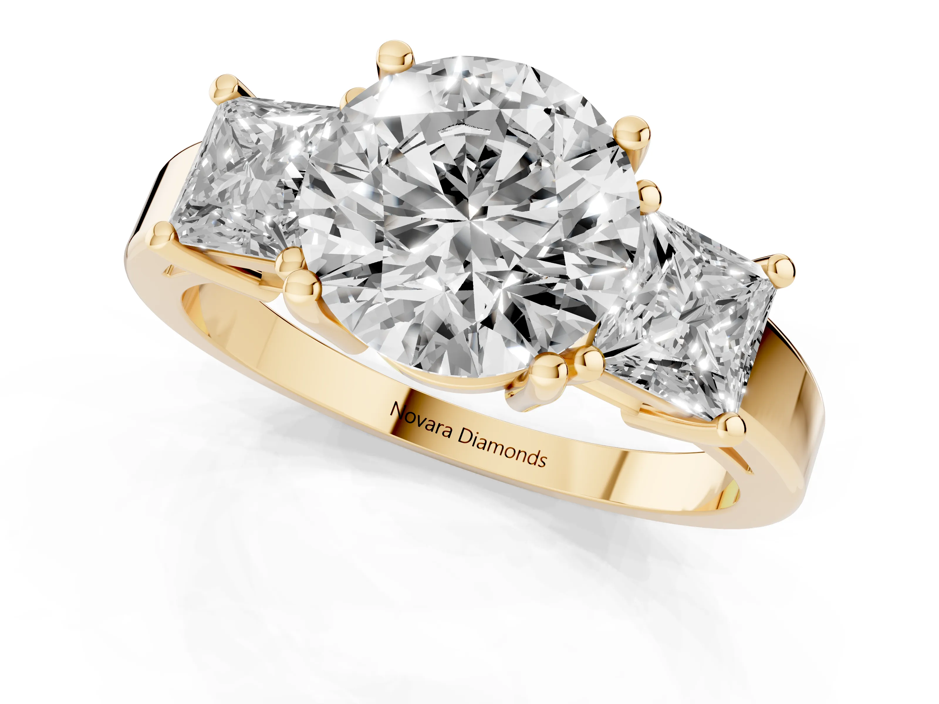 Three-Stone Round Cut Diamond Solitaire Ring Set in Yellow gold with Prong Setting
