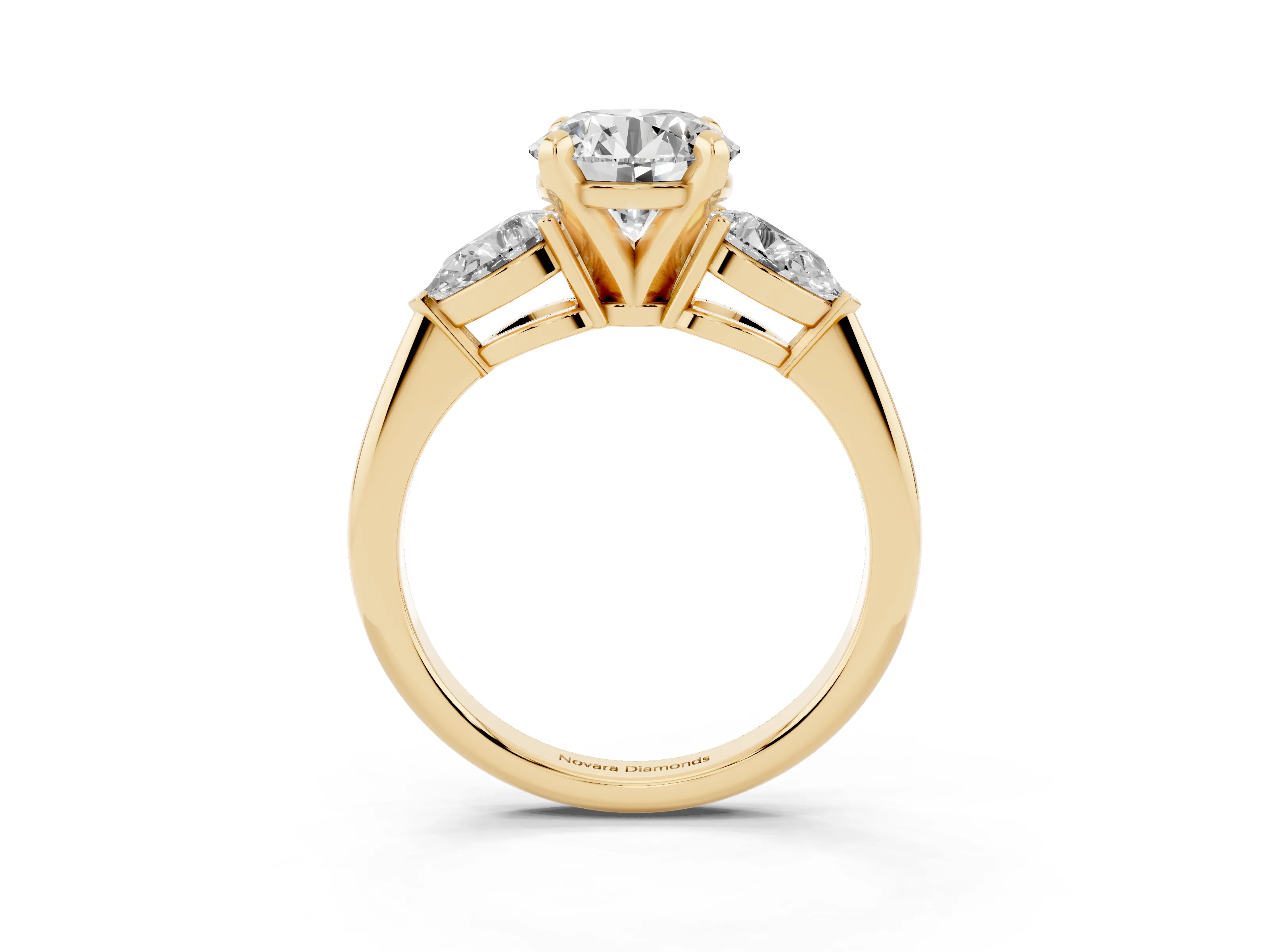 Three-Stone Round Cut Diamond Ring Set in Yellow gold with Pear Side Stones and Prong Setting