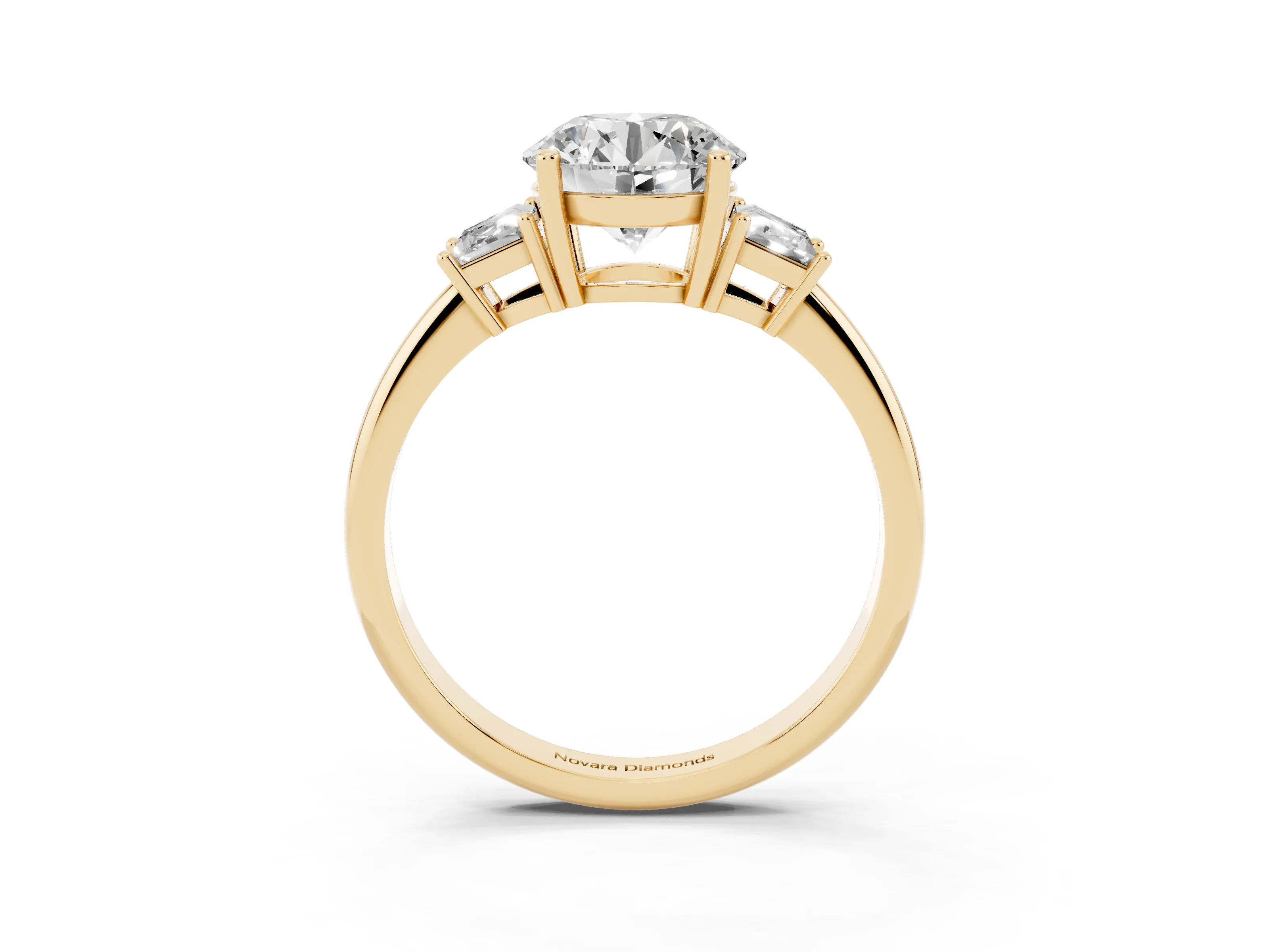 Round Cut Diamond Three-Stone Ring Set in Yellow gold with Trapezoid Side Stones and Prong Setting