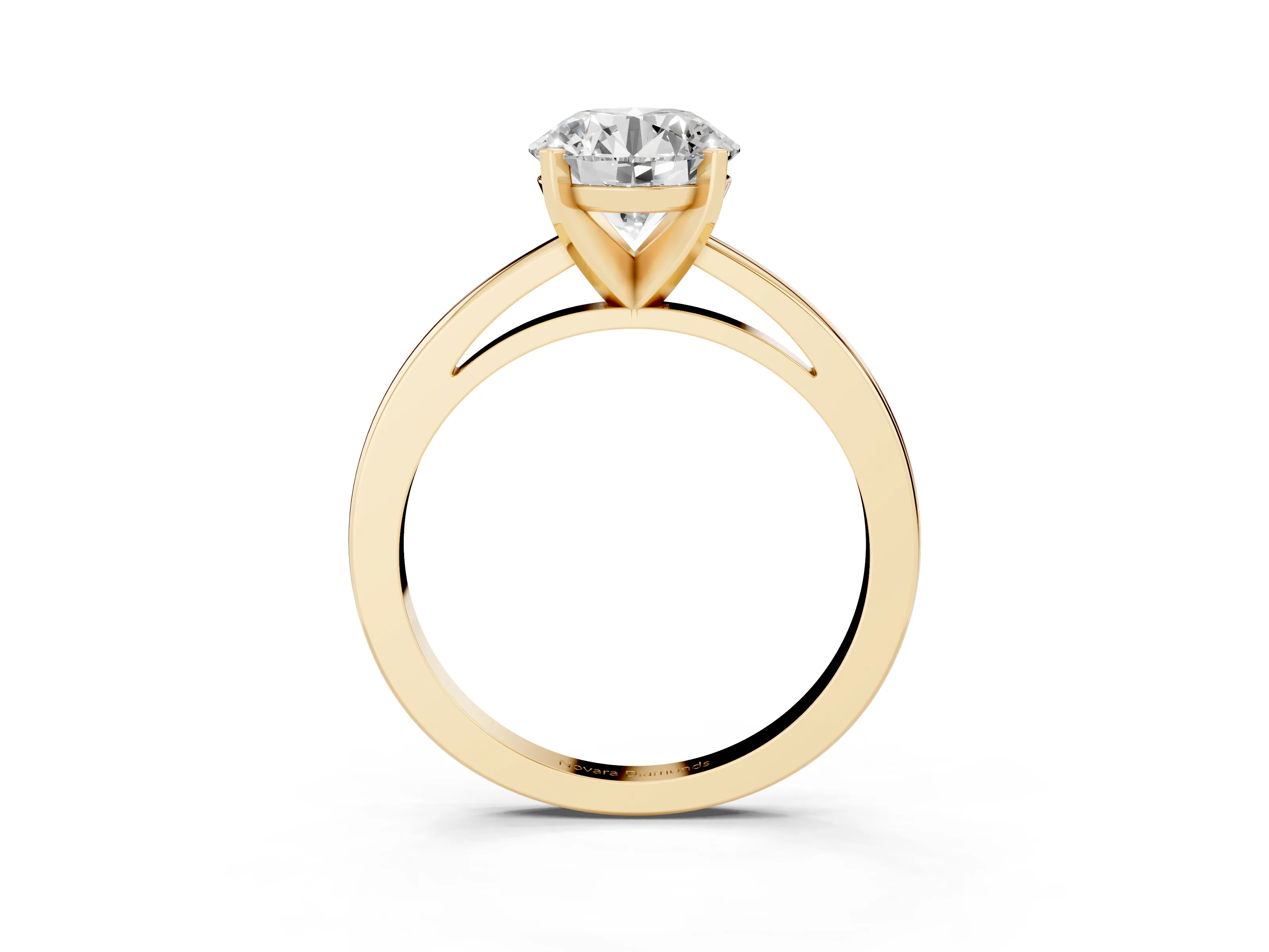 Round Cut Diamond Solitaire Engagement Ring Set in Yellow gold with Prong Setting on a Classic Band