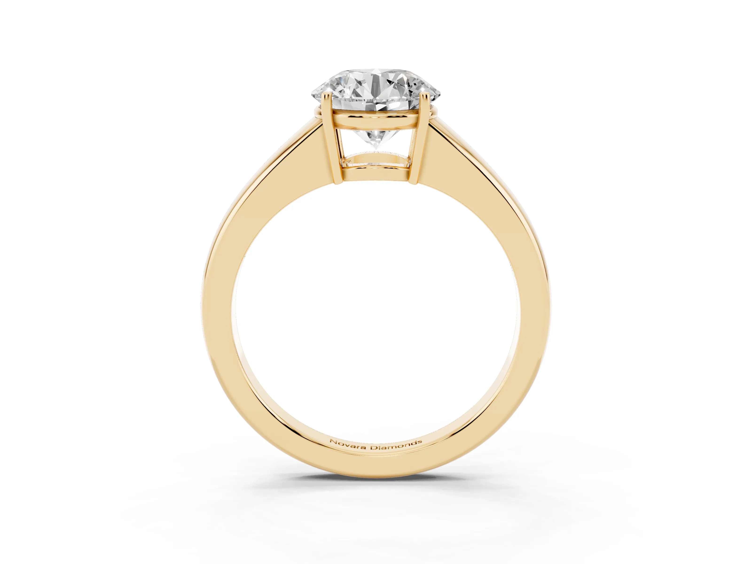 Round Cut Diamond Solitaire Ring Set in Yellow gold with Tapered Band and Prong Setting