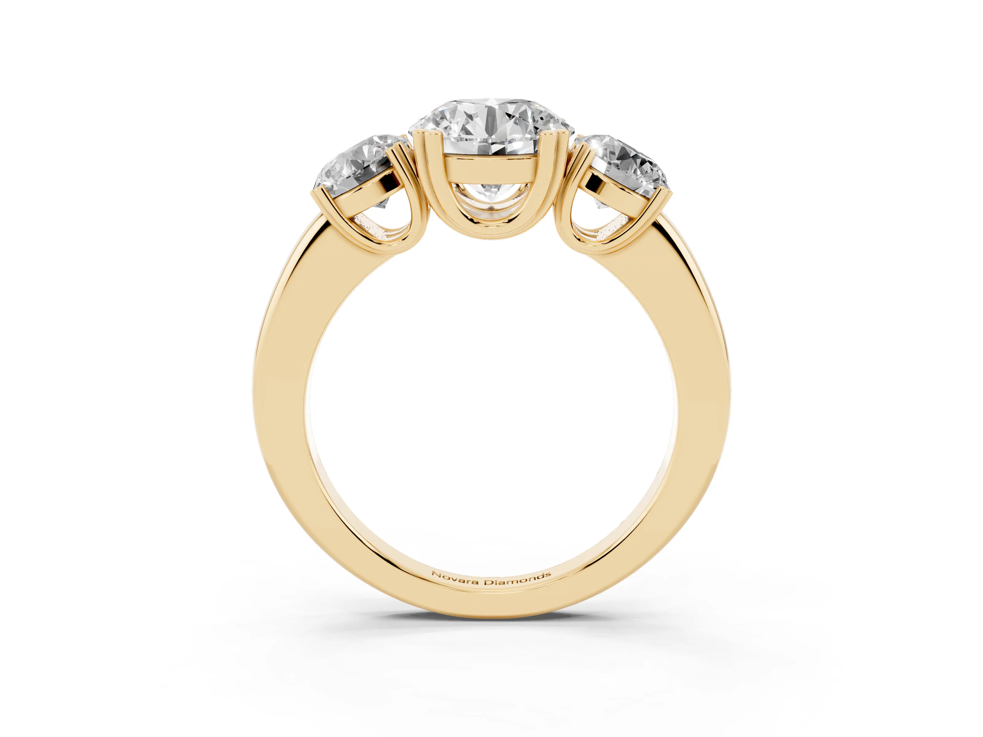 Round Cut Diamond Three-Stone Ring Set in Yellow gold with Polished Channel-Set Band