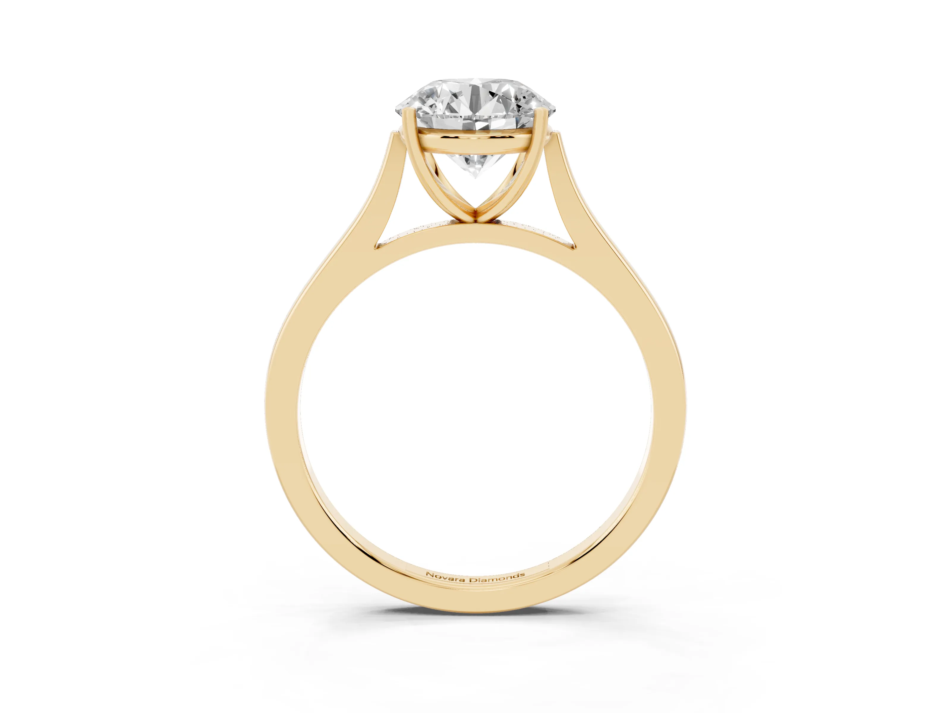 Round Cut Diamond Solitaire Heart Prong Engagement Ring Set in Yellow gold with Tapered Band