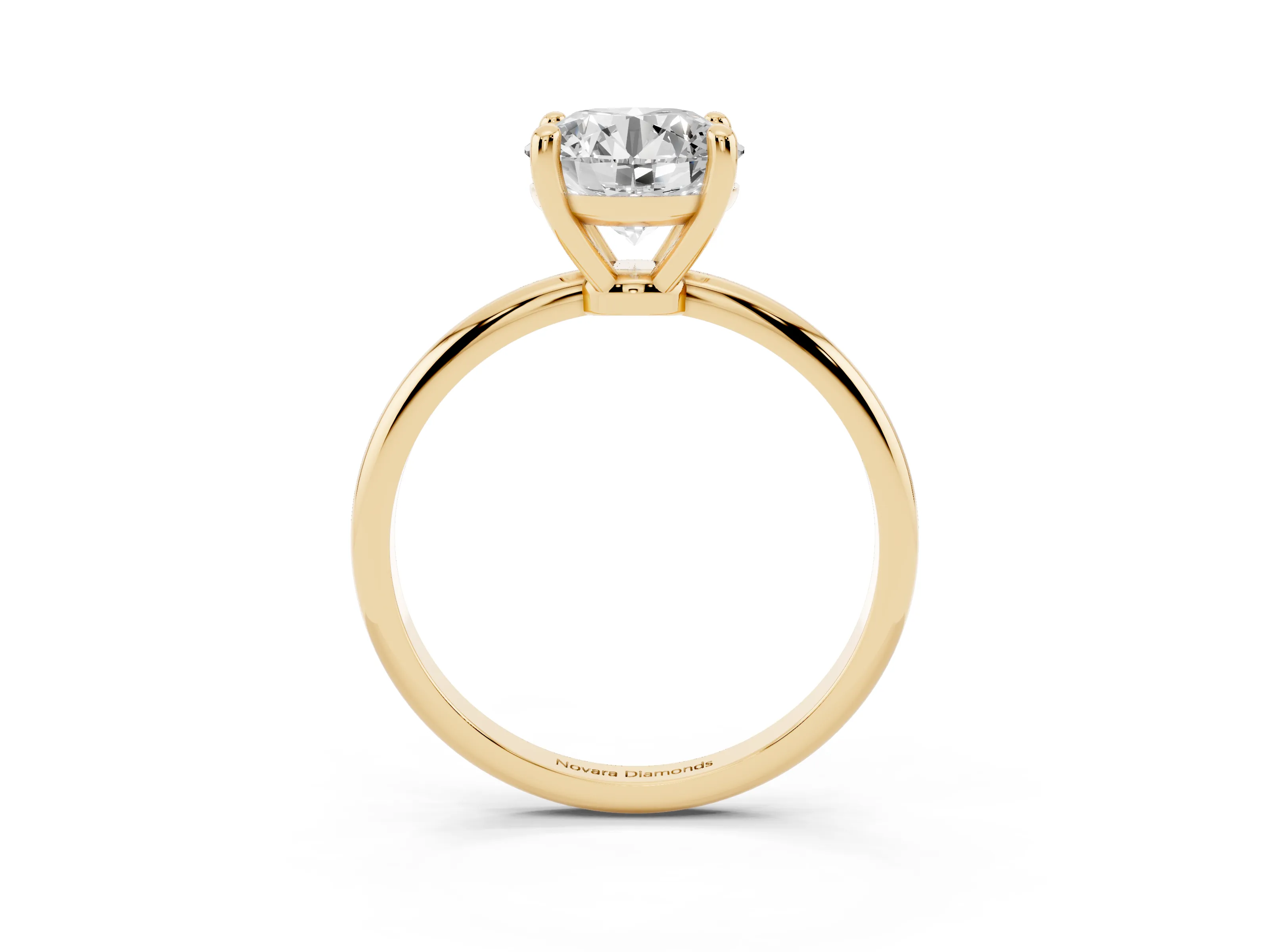 Round Cut Diamond Solitaire Ring Set in Yellow gold with Secure Prong Setting on a Classic Band