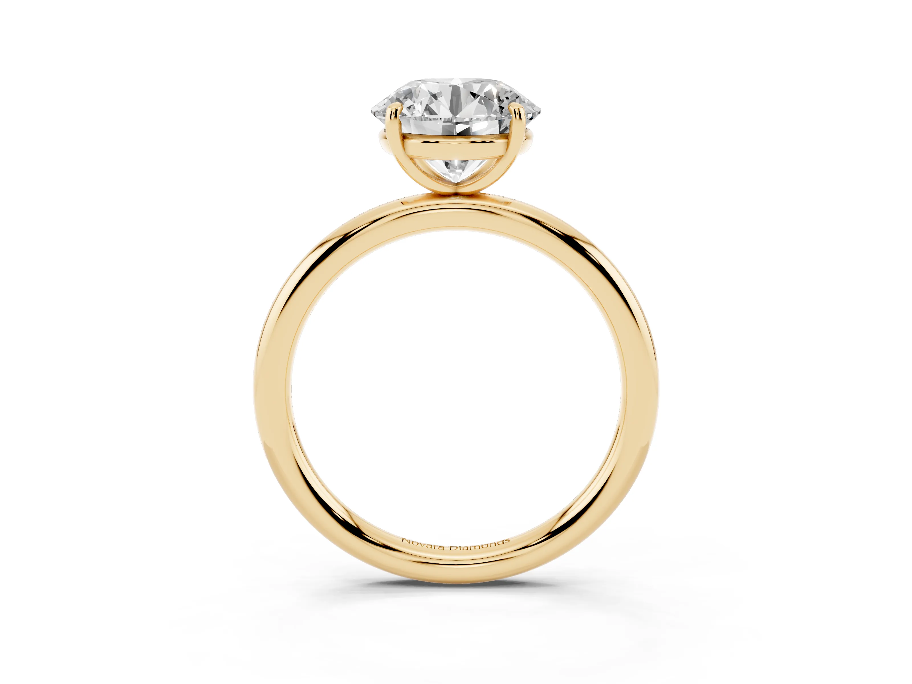 Round Cut Diamond Solitaire Ring Set in Yellow gold with Prong Setting on a Polished Plain Band