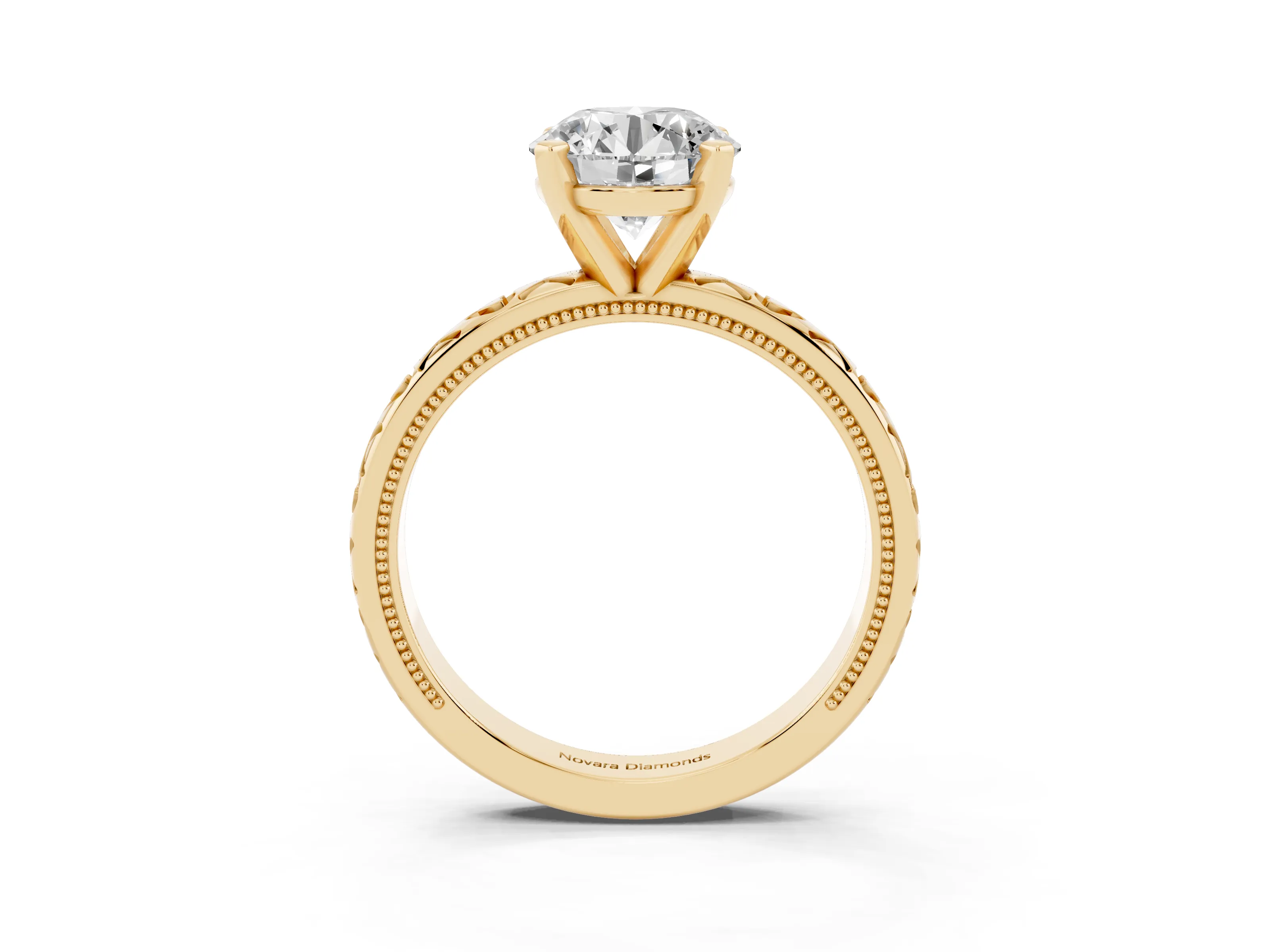 Round Cut Diamond Solitaire Engagement Ring Set in Yellow gold with XO Engraved Band and Prong Setting
