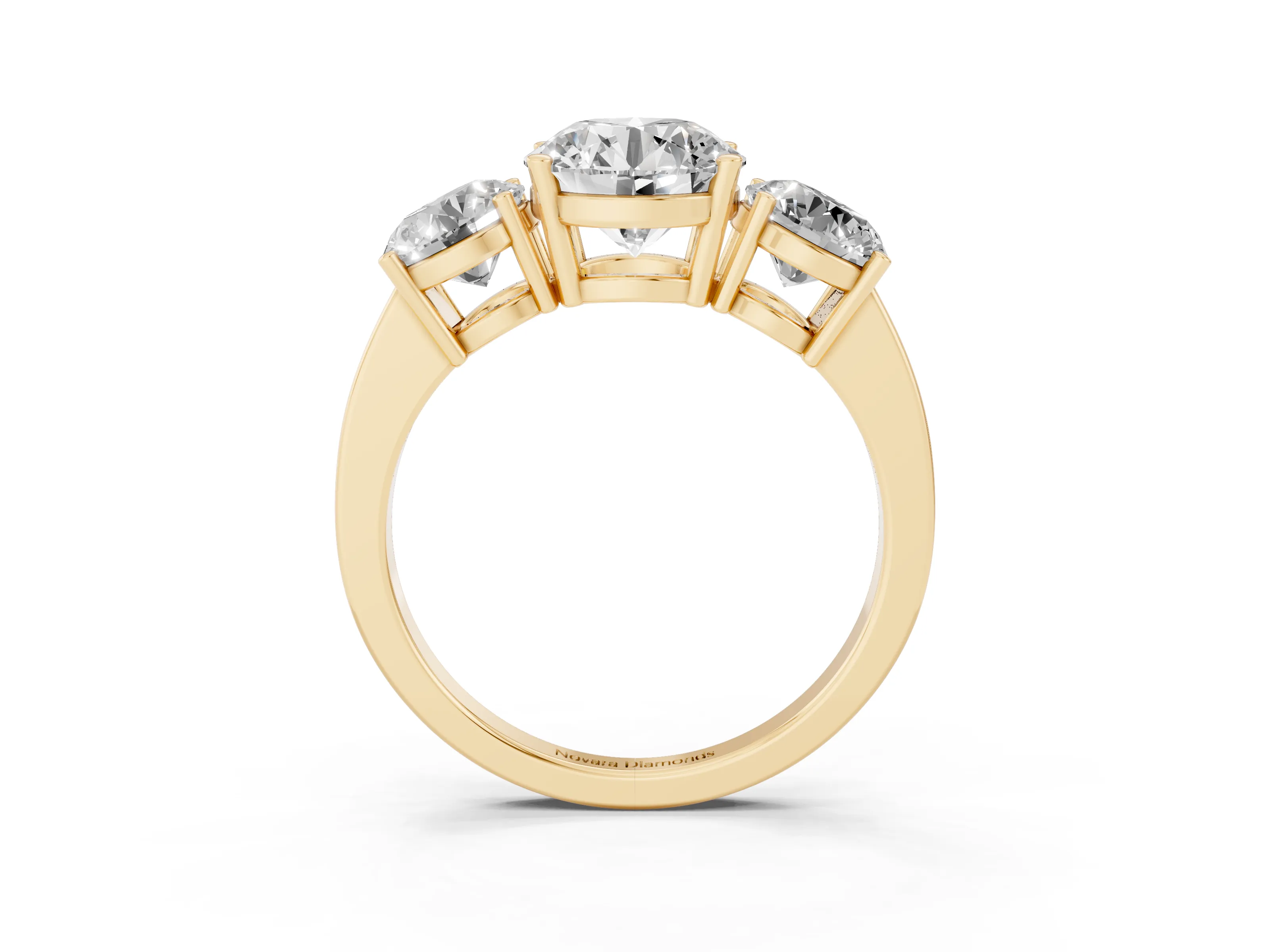 Round Cut Diamond Three-Stone Engagement Ring Set in Yellow gold with Flat Band