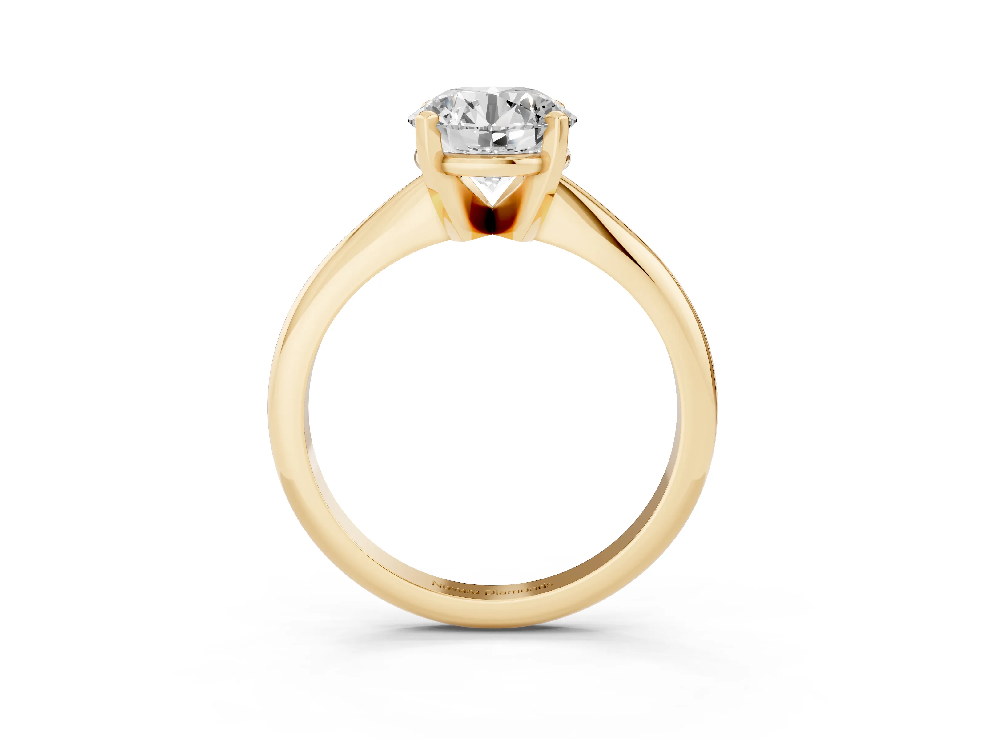 Round Cut Diamond Solitaire Ring Set in Yellow gold with Prong Setting on a Plain Round Band