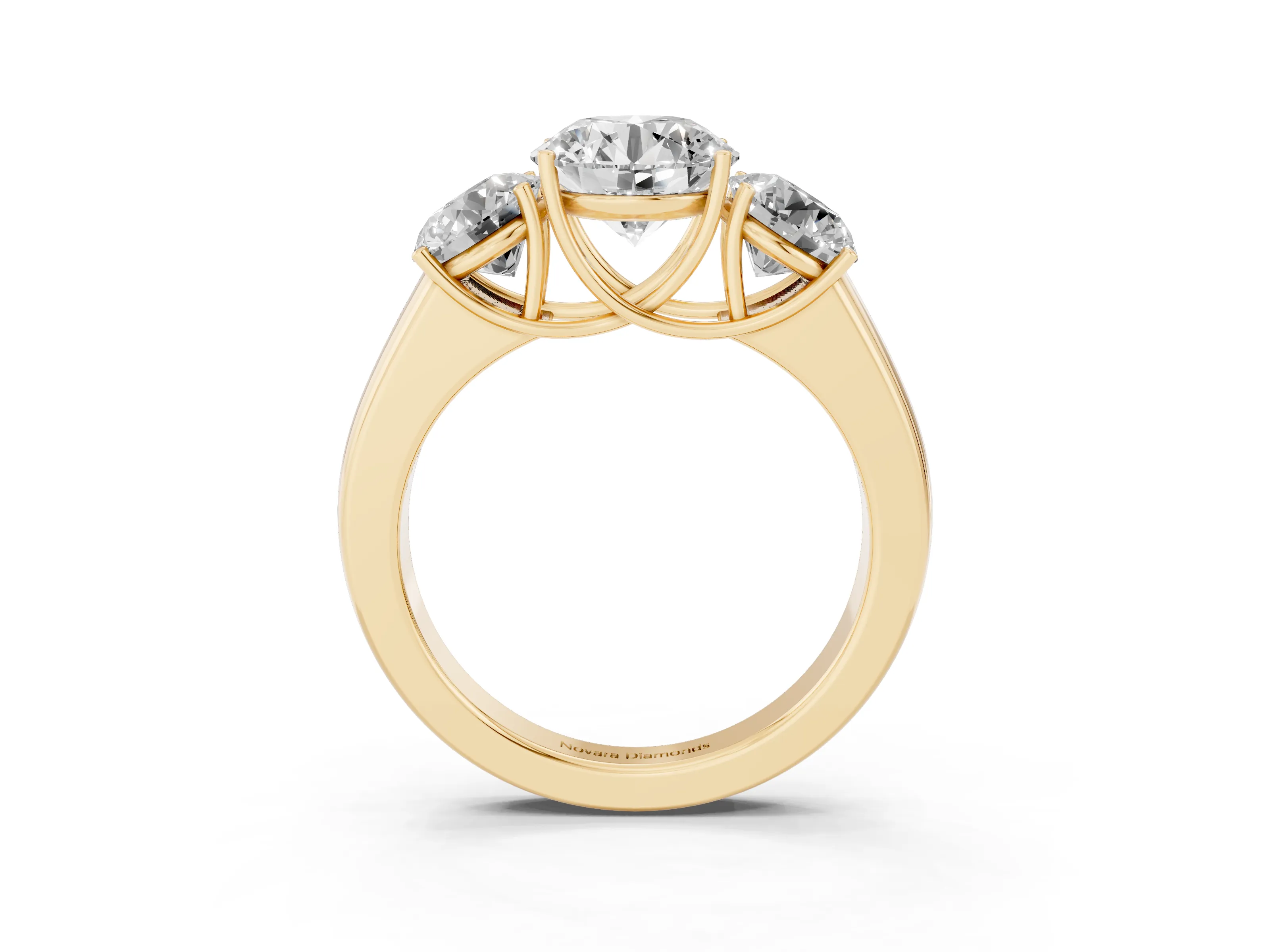 Three-Stone Round Cut Diamond Ring Set in Yellow gold with Matching Prong Settings and Plain Band