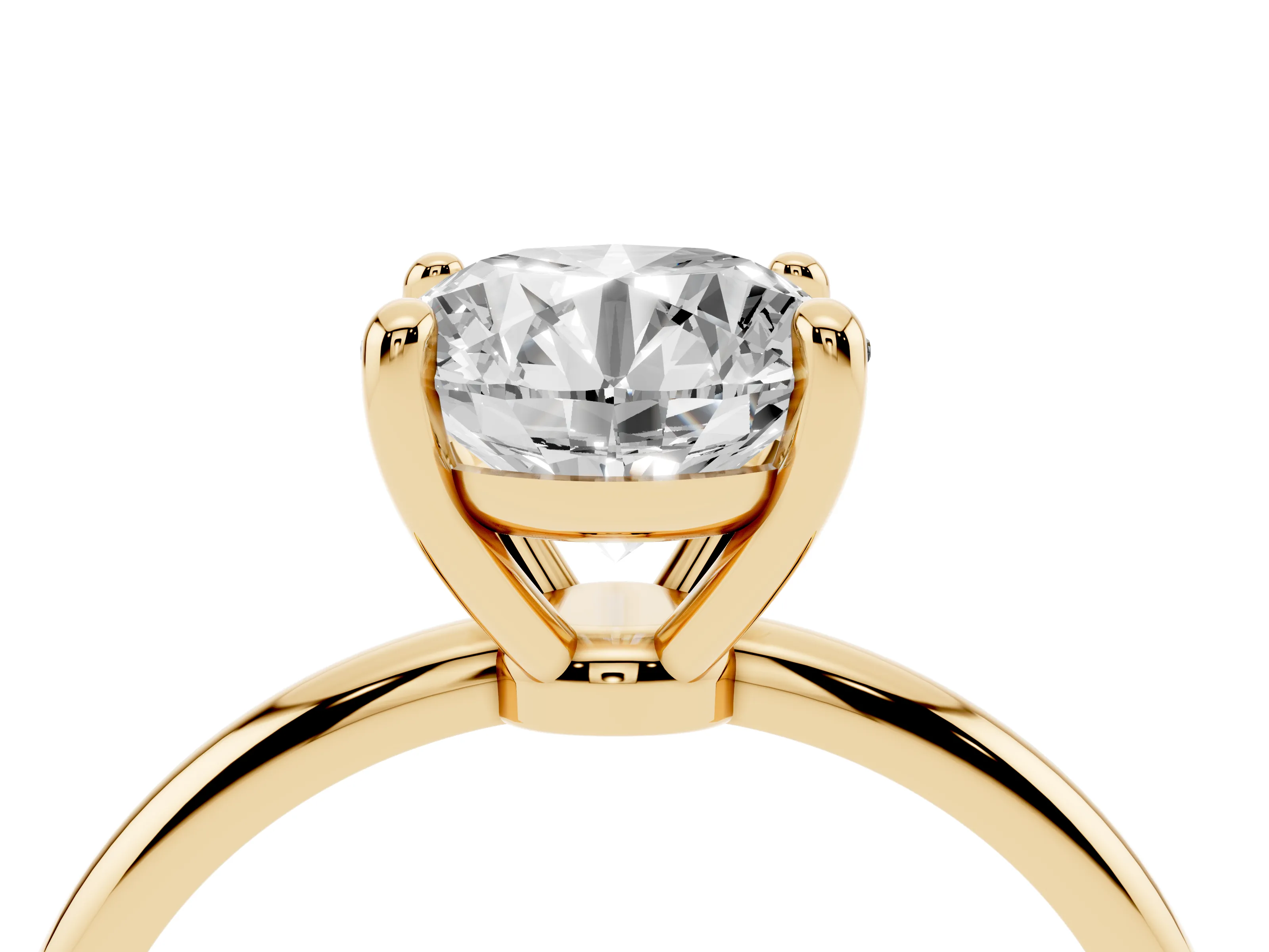 Round Cut Diamond Solitaire Ring Set in Yellow gold with Secure Prong Setting on a Classic Band