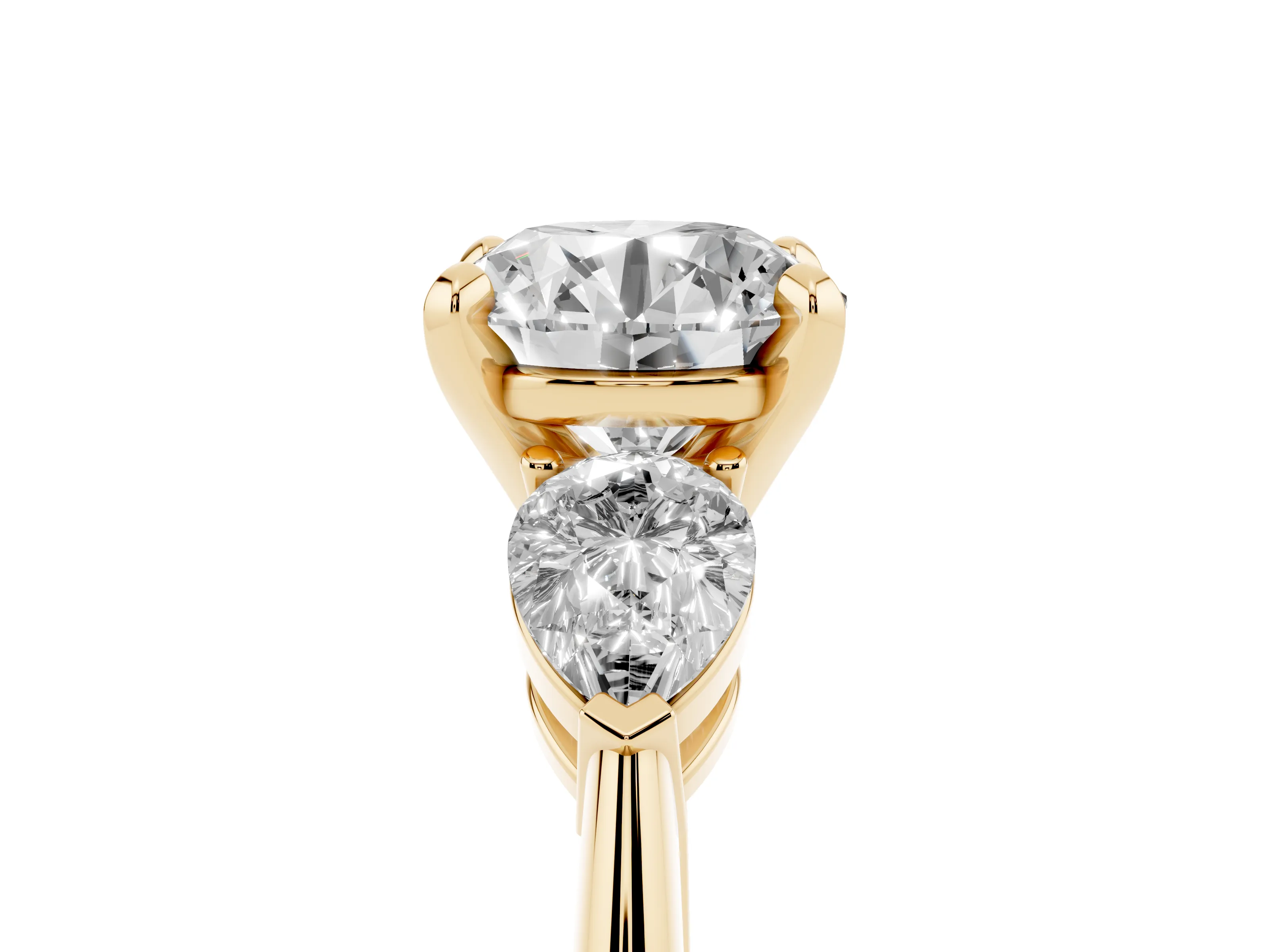 Three-Stone Round Cut Diamond Ring Set in Yellow gold with Pear Side Stones and Prong Setting
