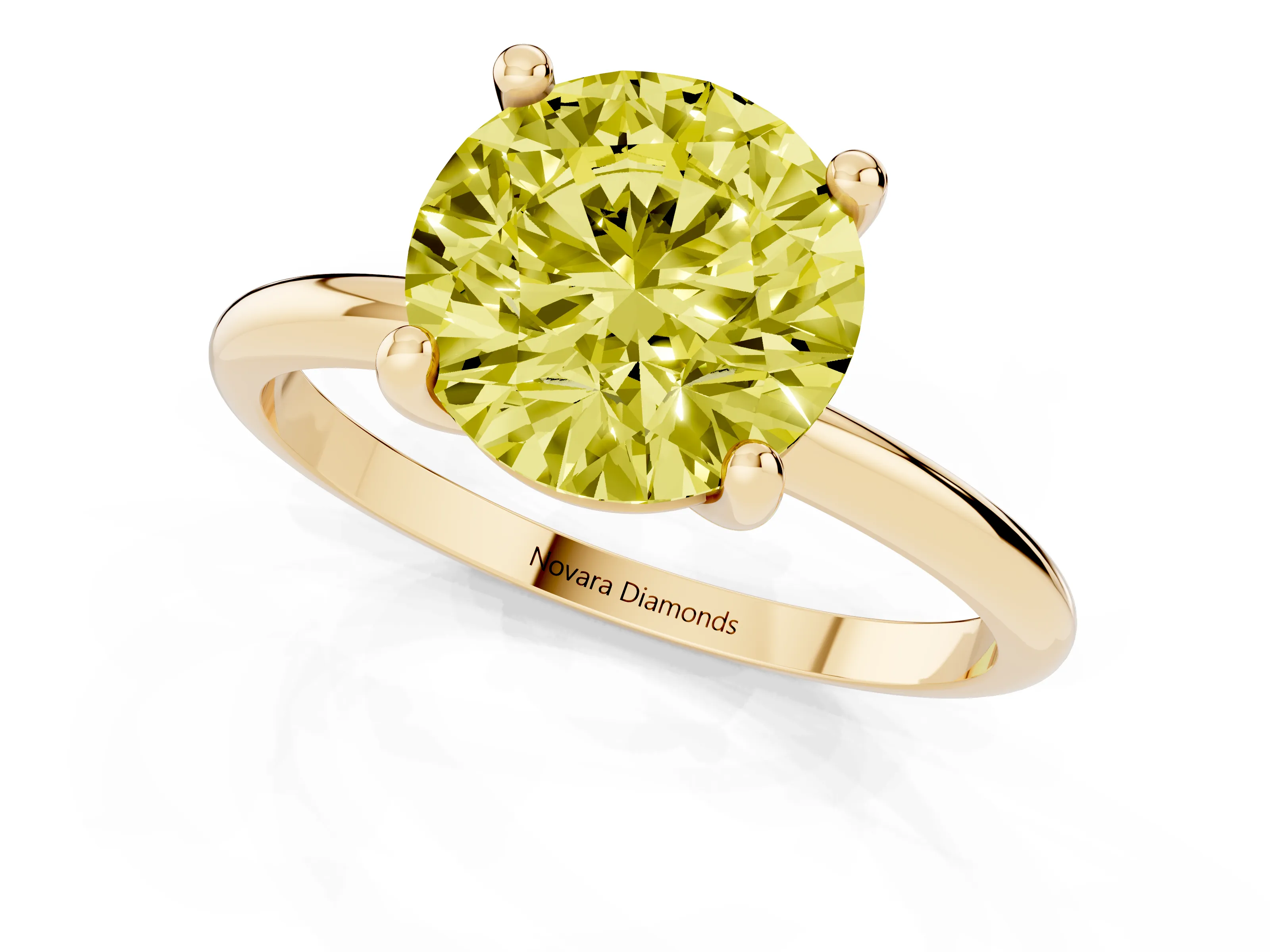 Fancy Yellow Round Cut Diamond Solitaire Ring Set in Yellow gold with Secure Prong Setting on a Classic Band