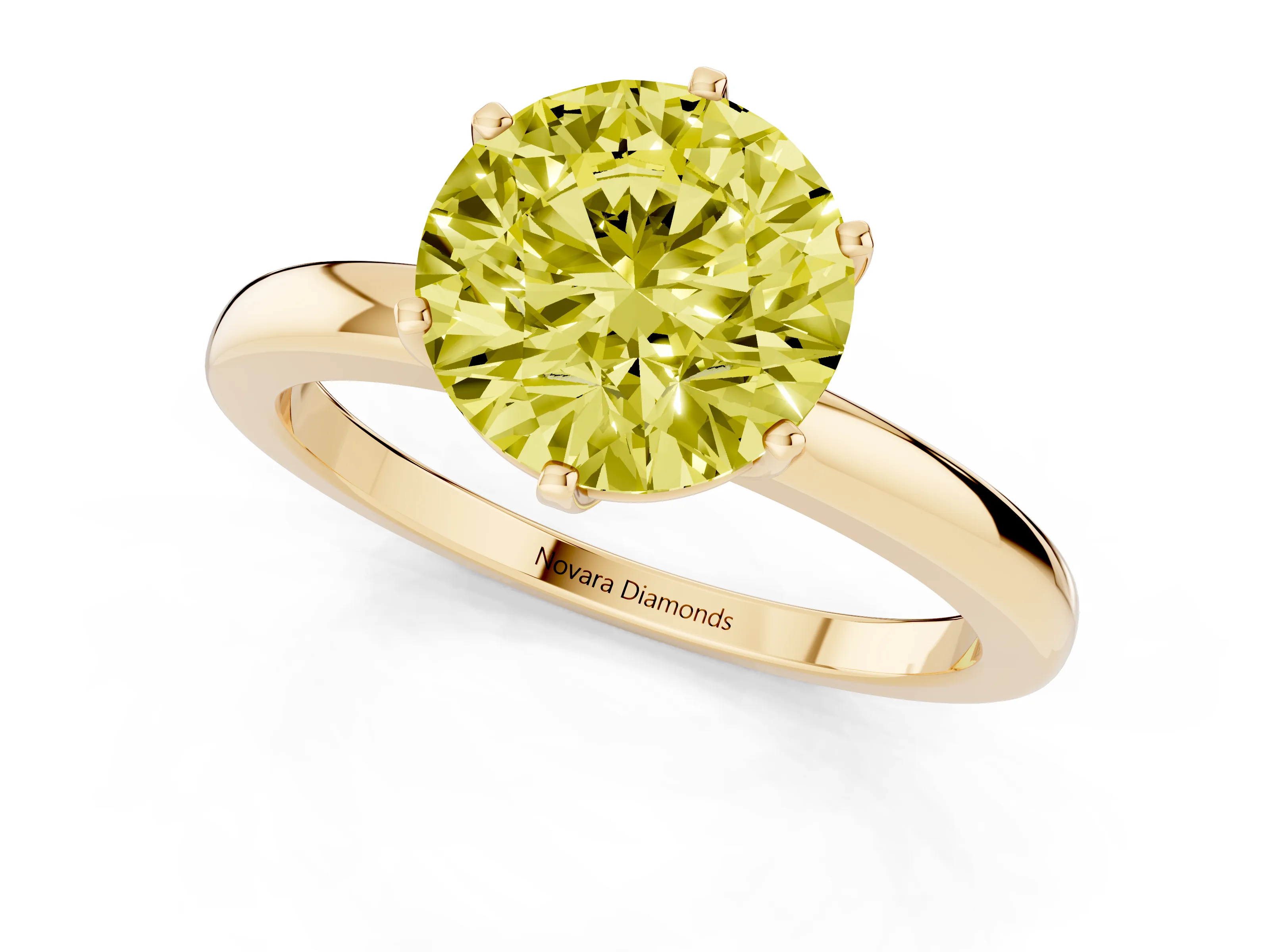 Fancy Yellow Round Cut Diamond Solitaire Ring Set in Yellow gold with Raised Prong Setting on a Classic Band