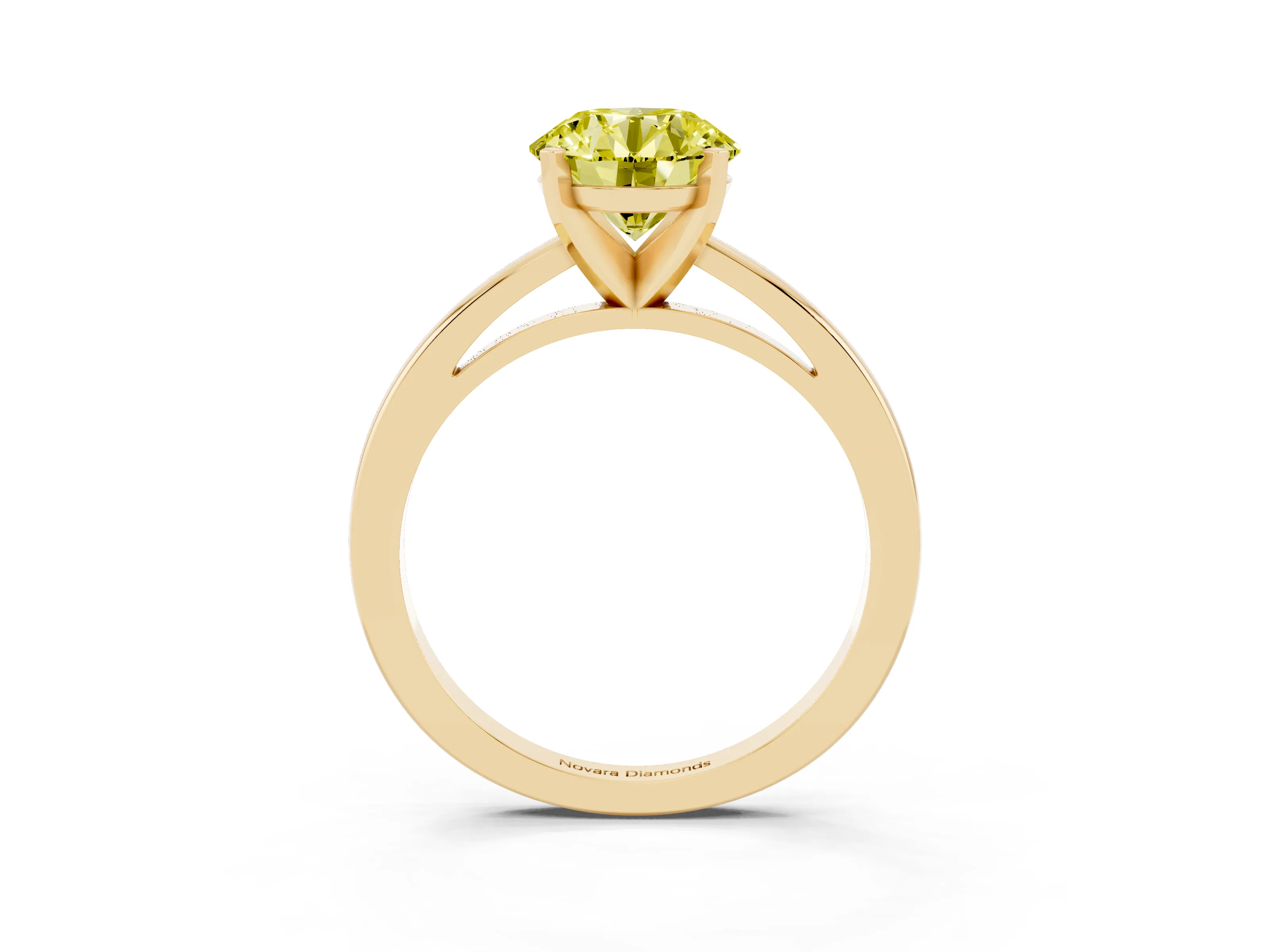 Fancy Yellow Round Cut Diamond Solitaire Engagement Ring Set in Yellow gold with Prong Setting on a Classic Band