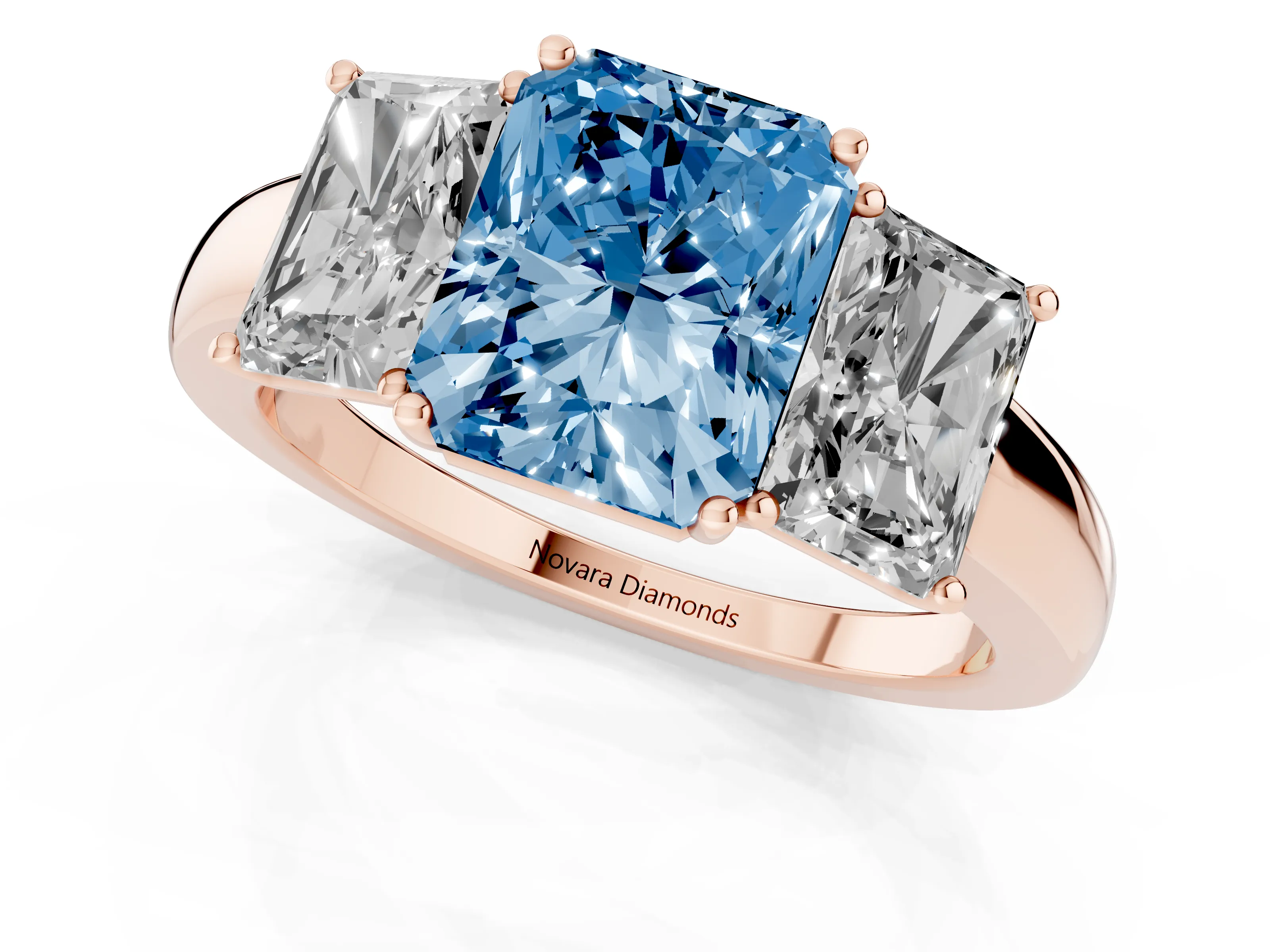 Fancy Blue Radiant Cut Diamond Three-Stone Ring Set in Rose gold with Bold Center and Classic Band