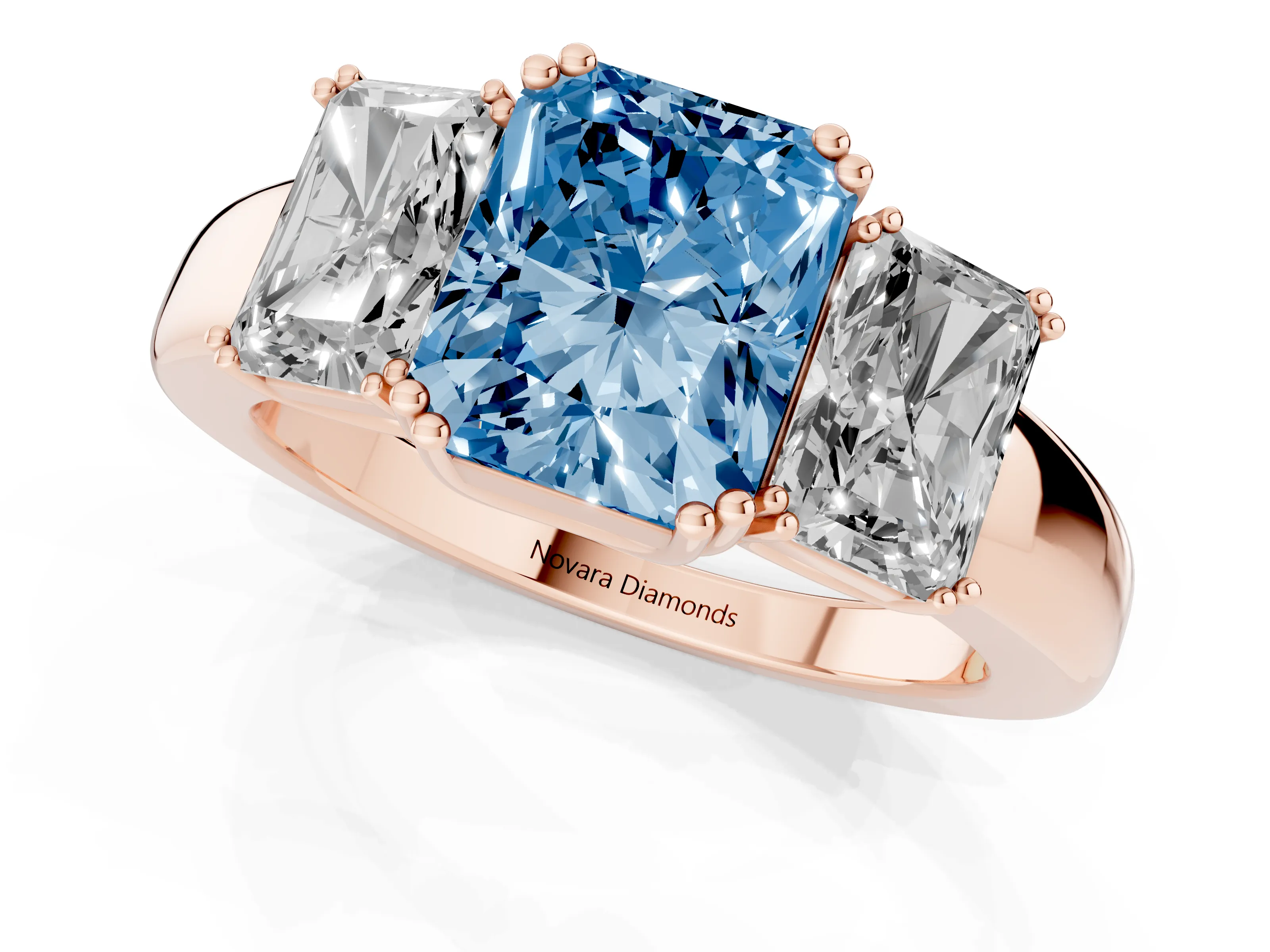 Fancy Blue Radiant Cut Diamond Three-Stone Ring Set in Rose gold with Polished Channel-Set Band