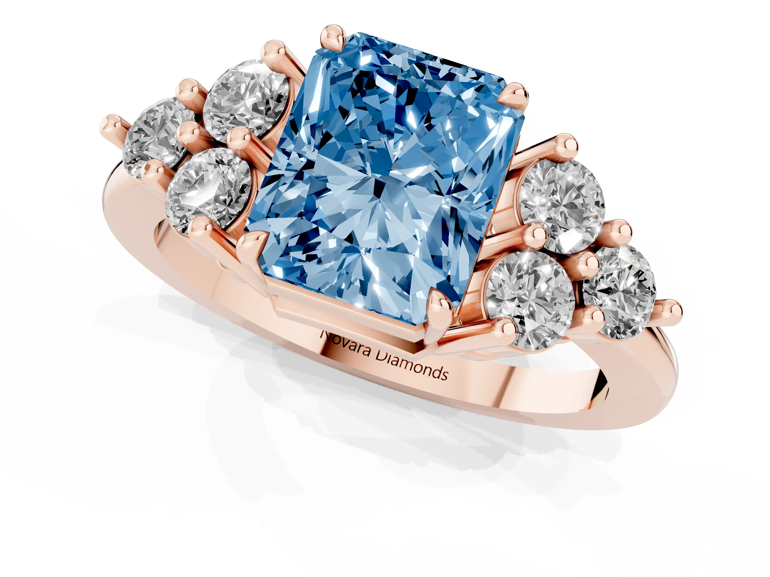 Fancy Blue Radiant Cut Diamond Solitaire Ring Set in Rose gold with Cluster Accents on Each Side