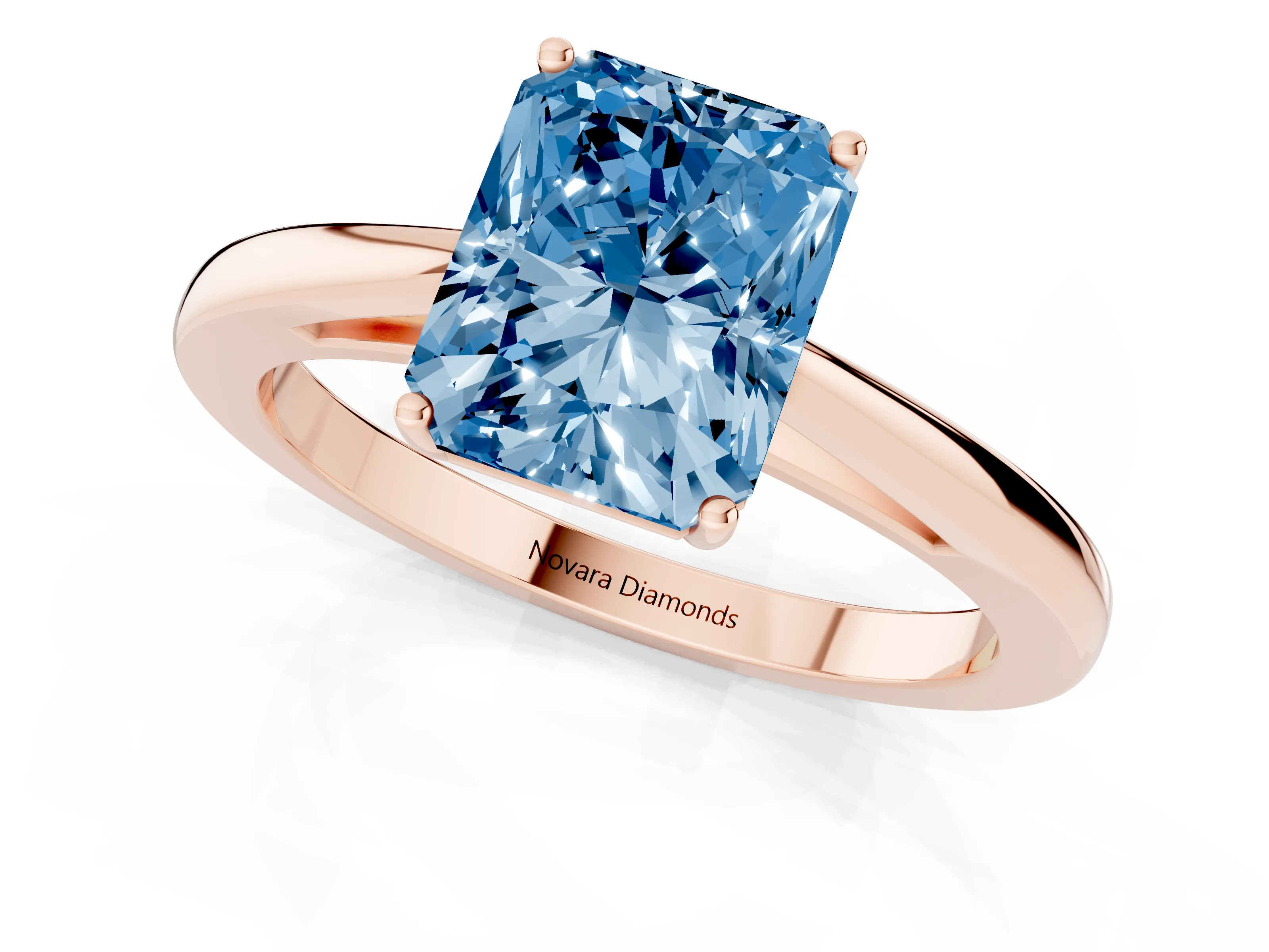 Fancy Blue Radiant Cut Diamond Solitaire Ring Set in Rose gold with Split Shank and Prong Setting