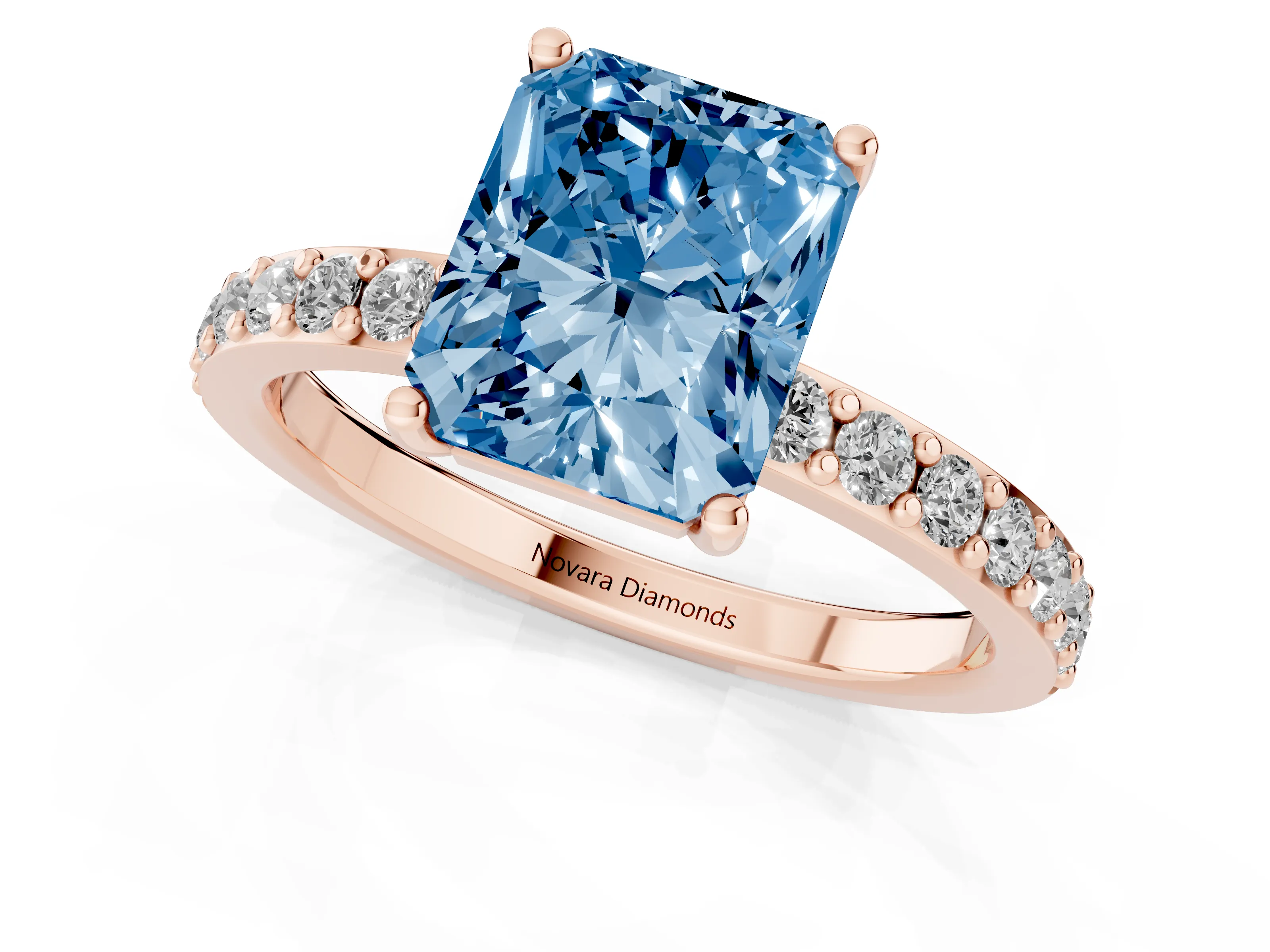 Fancy Blue Radiant Cut Diamond Solitaire Set in Rose gold with Round Pavé Band and Prong Setting