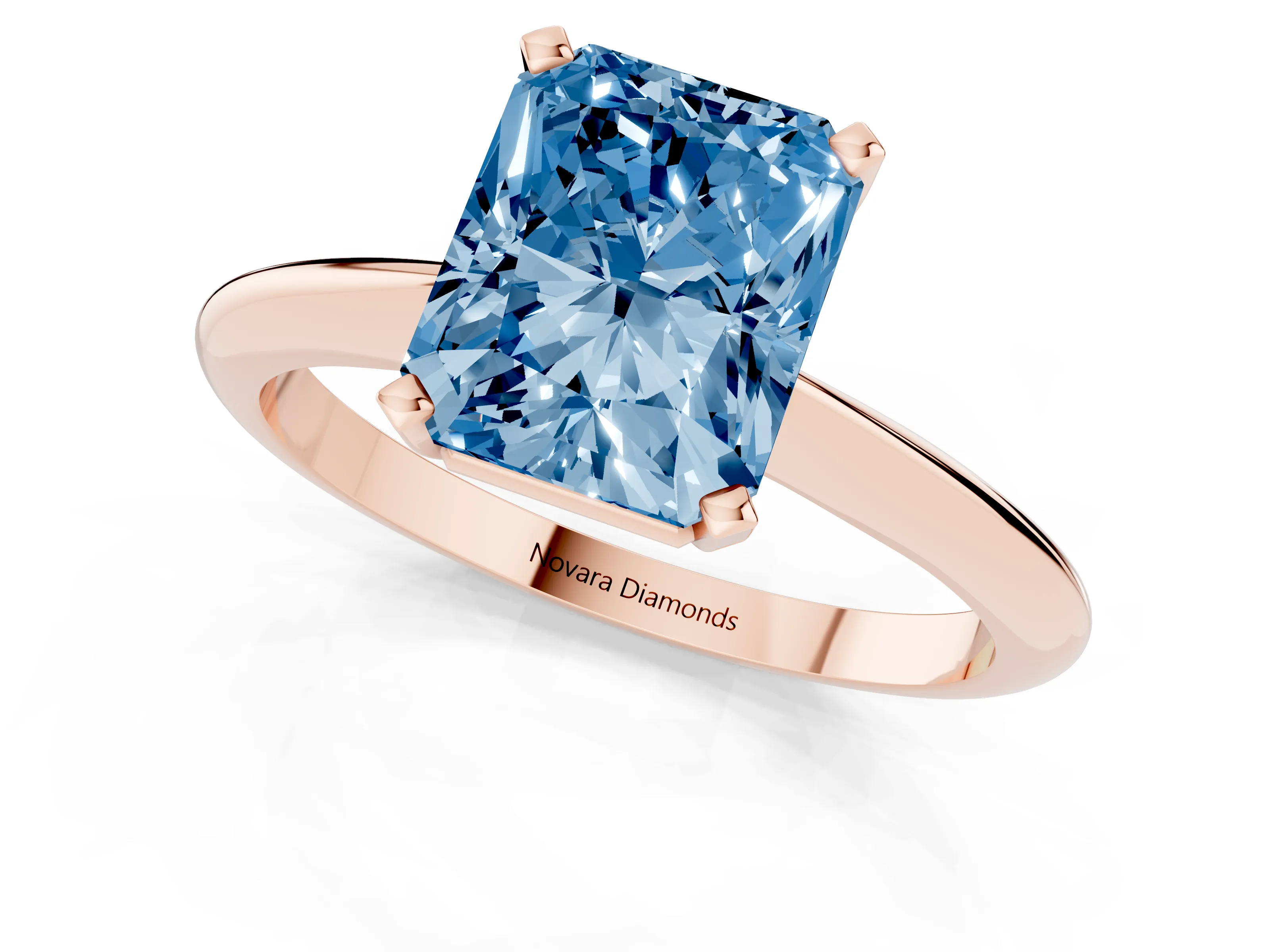 Fancy Blue Radiant Cut Diamond Solitaire Ring Set in Rose gold with Prong Setting on a Plain Round Band