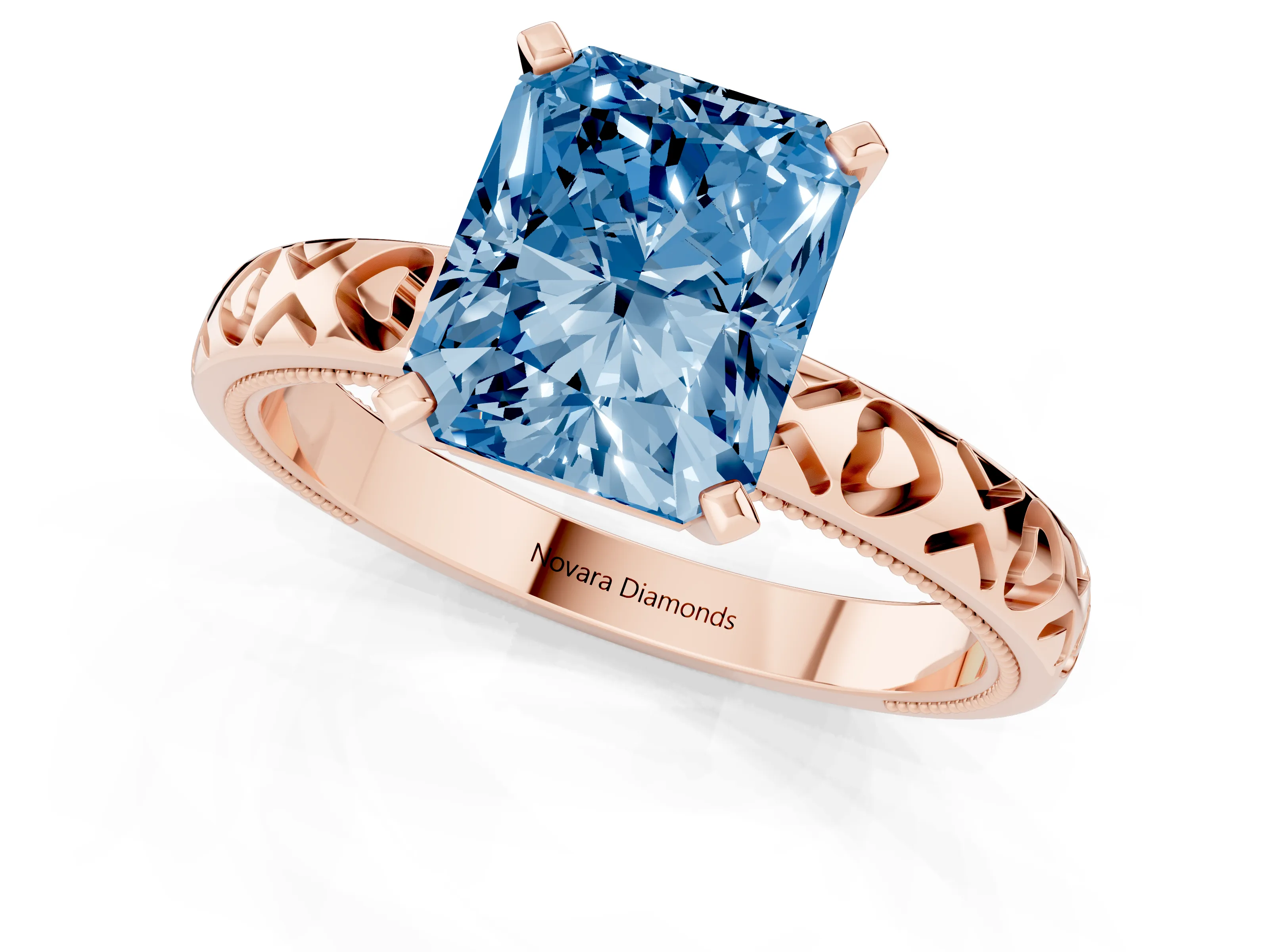 Fancy Blue Radiant Cut Diamond Solitaire Engagement Ring Set in Rose gold with XO Engraved Band and Prong Setting