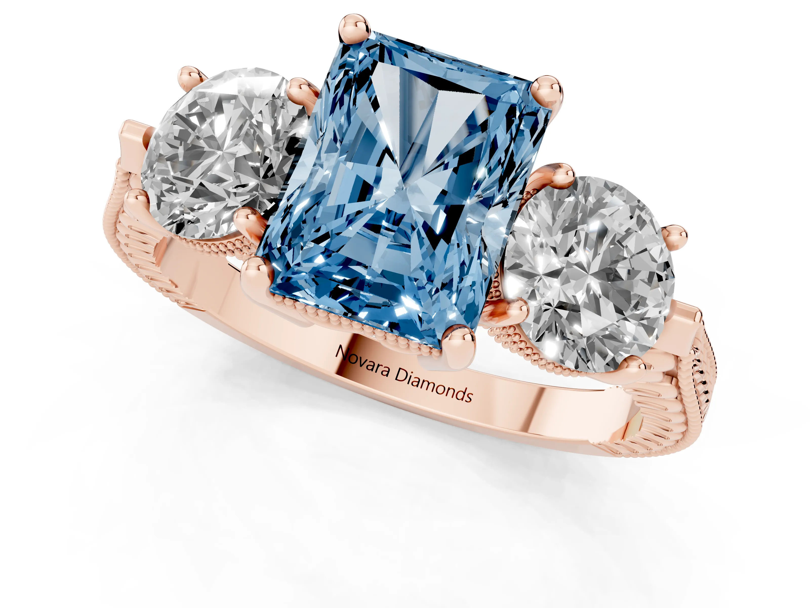 Fancy Blue Radiant Cut Diamond Three-Stone Ring Set in Rose gold with Milgrain Band