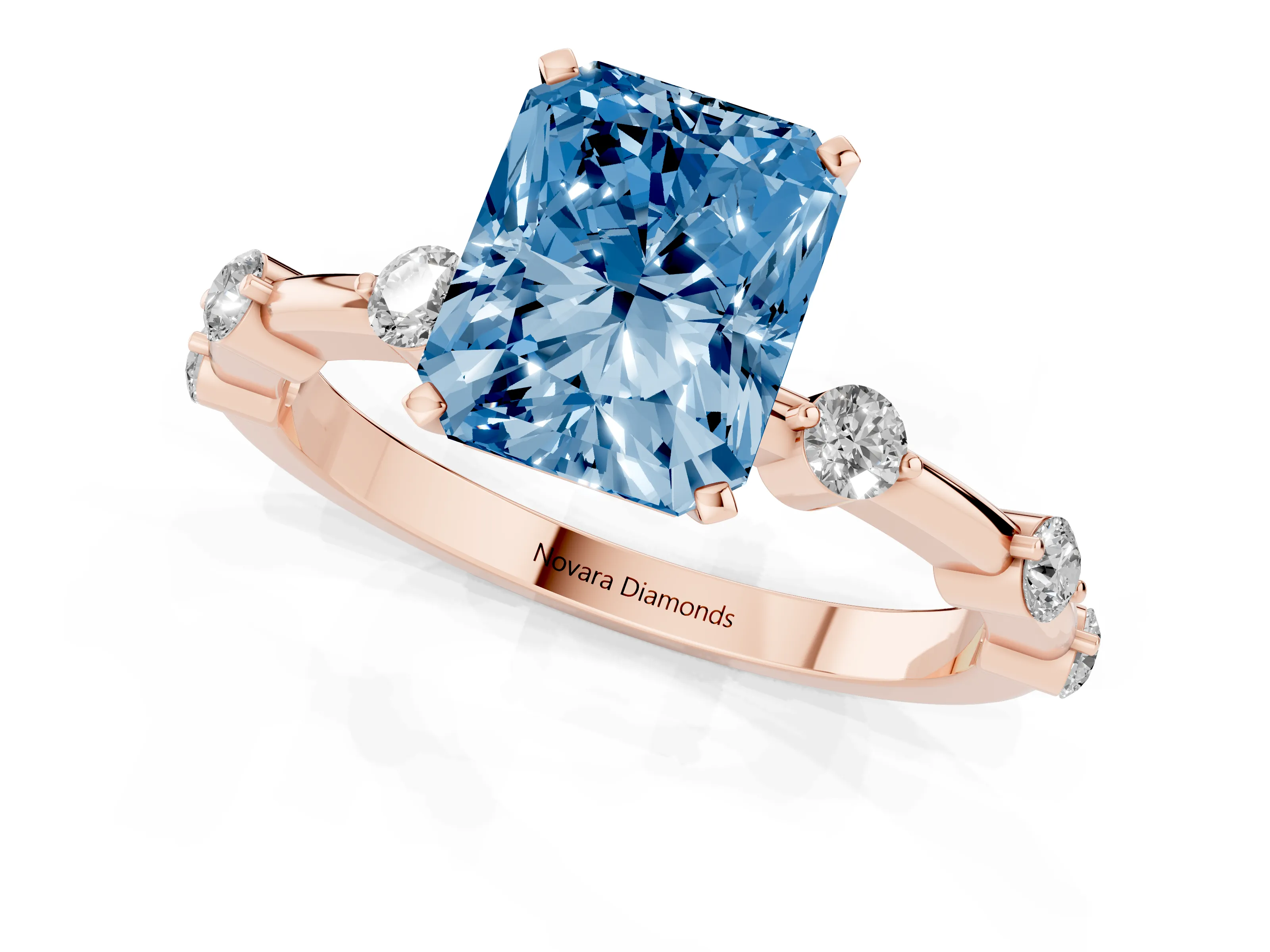 Fancy Blue Radiant Cut Diamond Solitaire Ring Set in Rose gold with Bezel Set Side Stones and Prong Setting