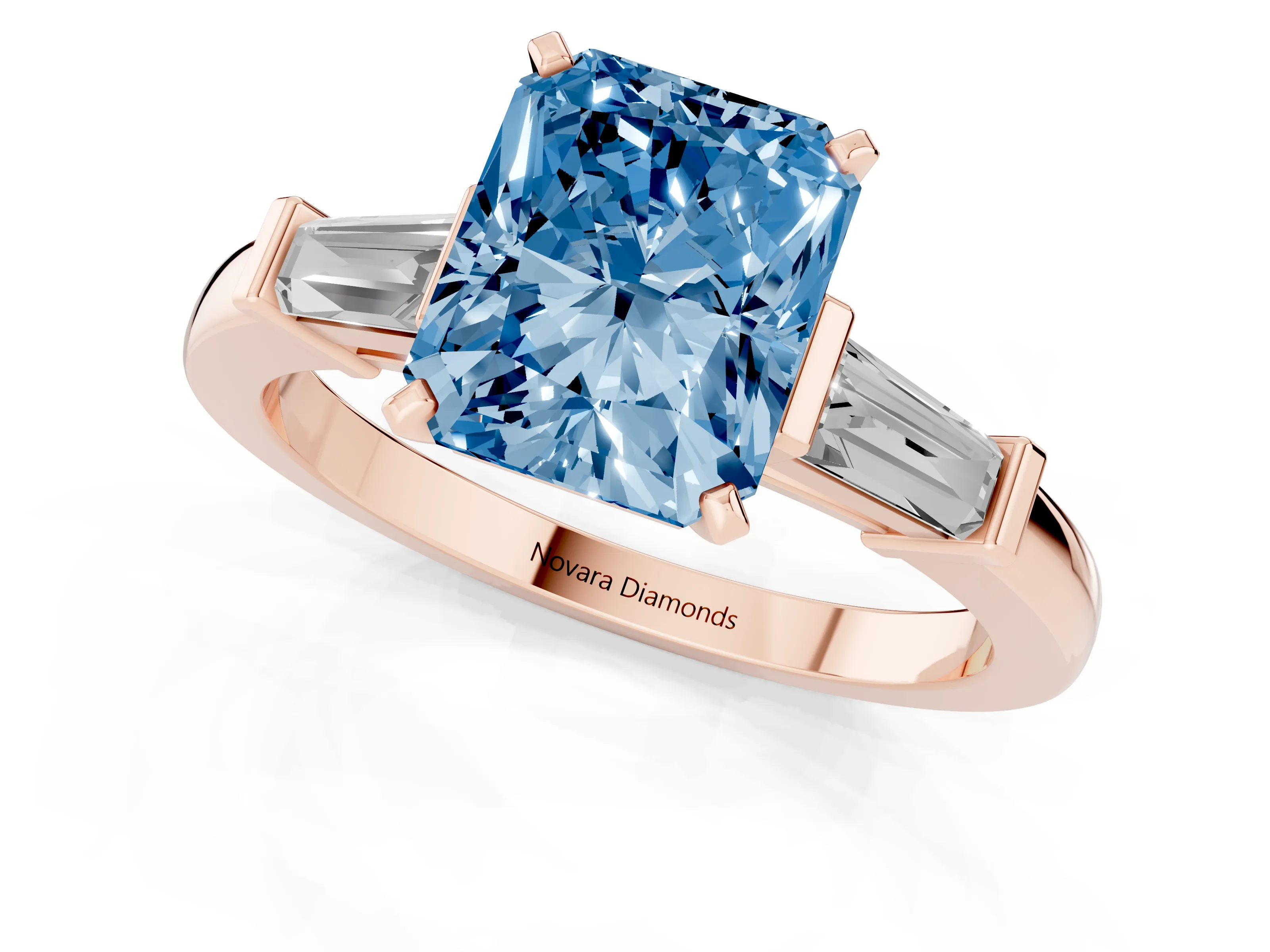 Fancy Blue Radiant Cut Diamond Solitaire Ring Set in Rose gold with Tapered Baguette Accents and Prong Setting