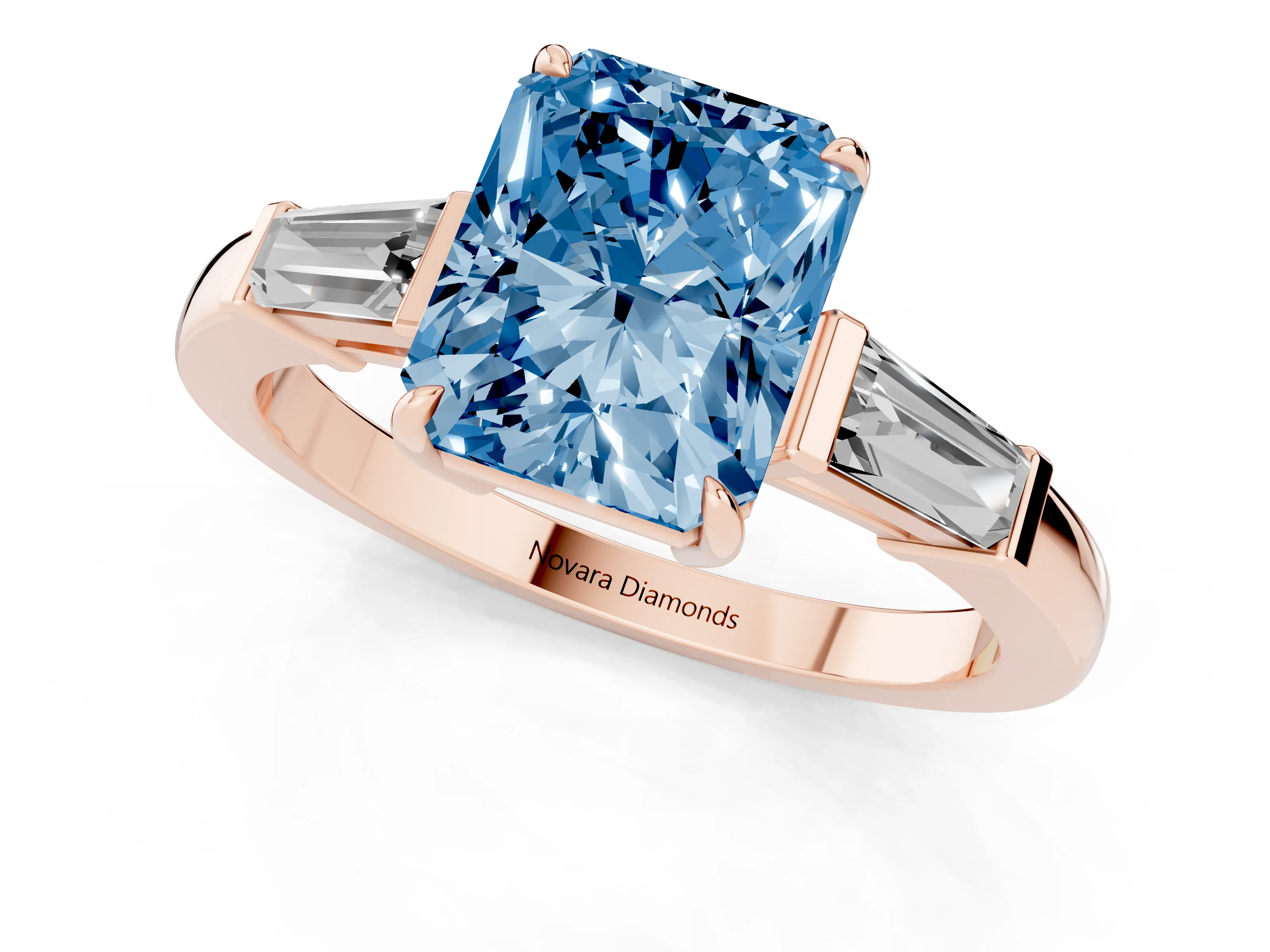 Fancy Blue Radiant Cut Diamond Three-Stone Ring Set in Rose gold with Tapered Baguette Side Stones and Prong Setting