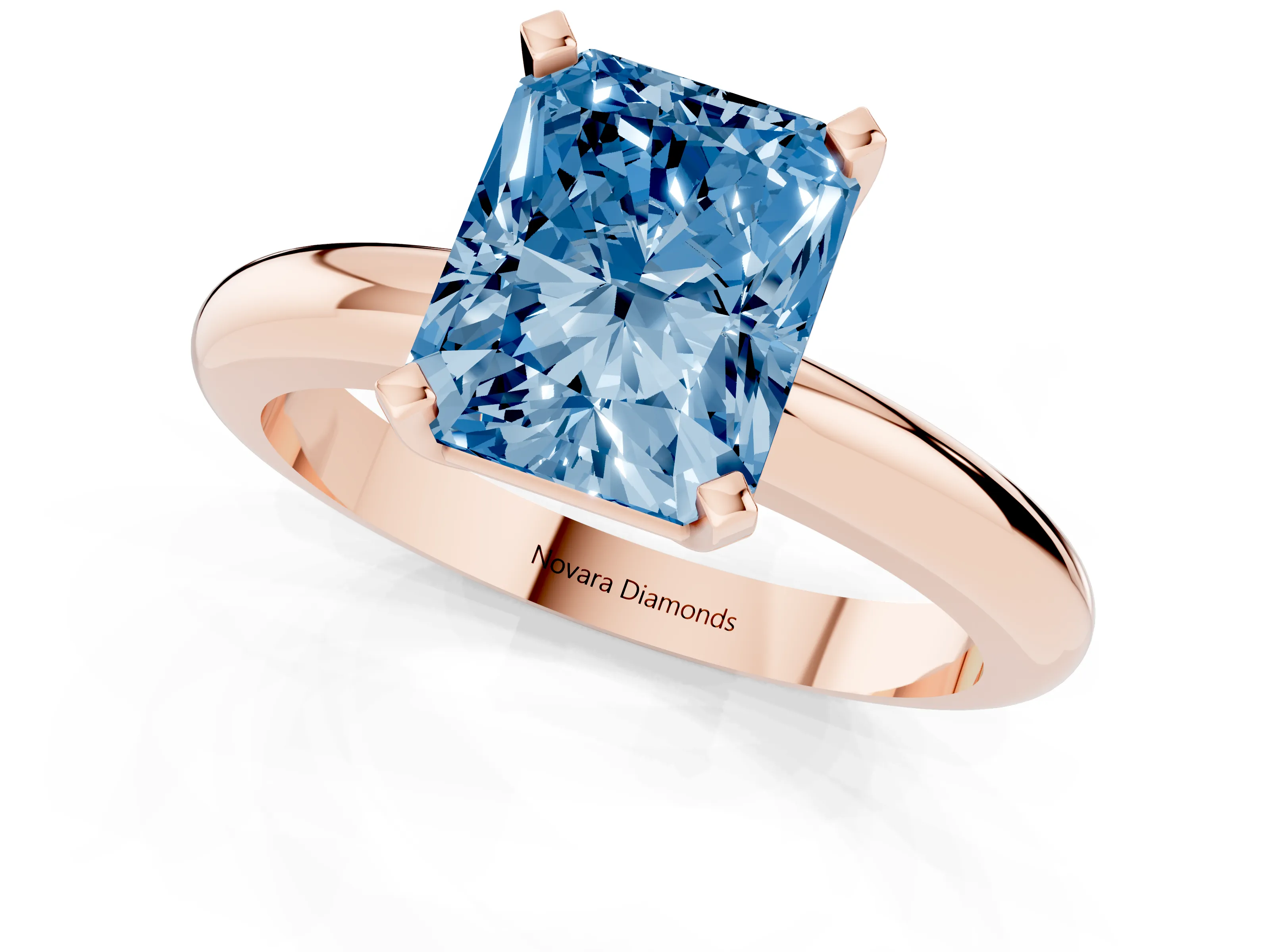 Fancy Blue Radiant Cut Diamond Solitaire Engagement Ring Set in Rose gold with Round Band and Prong Setting