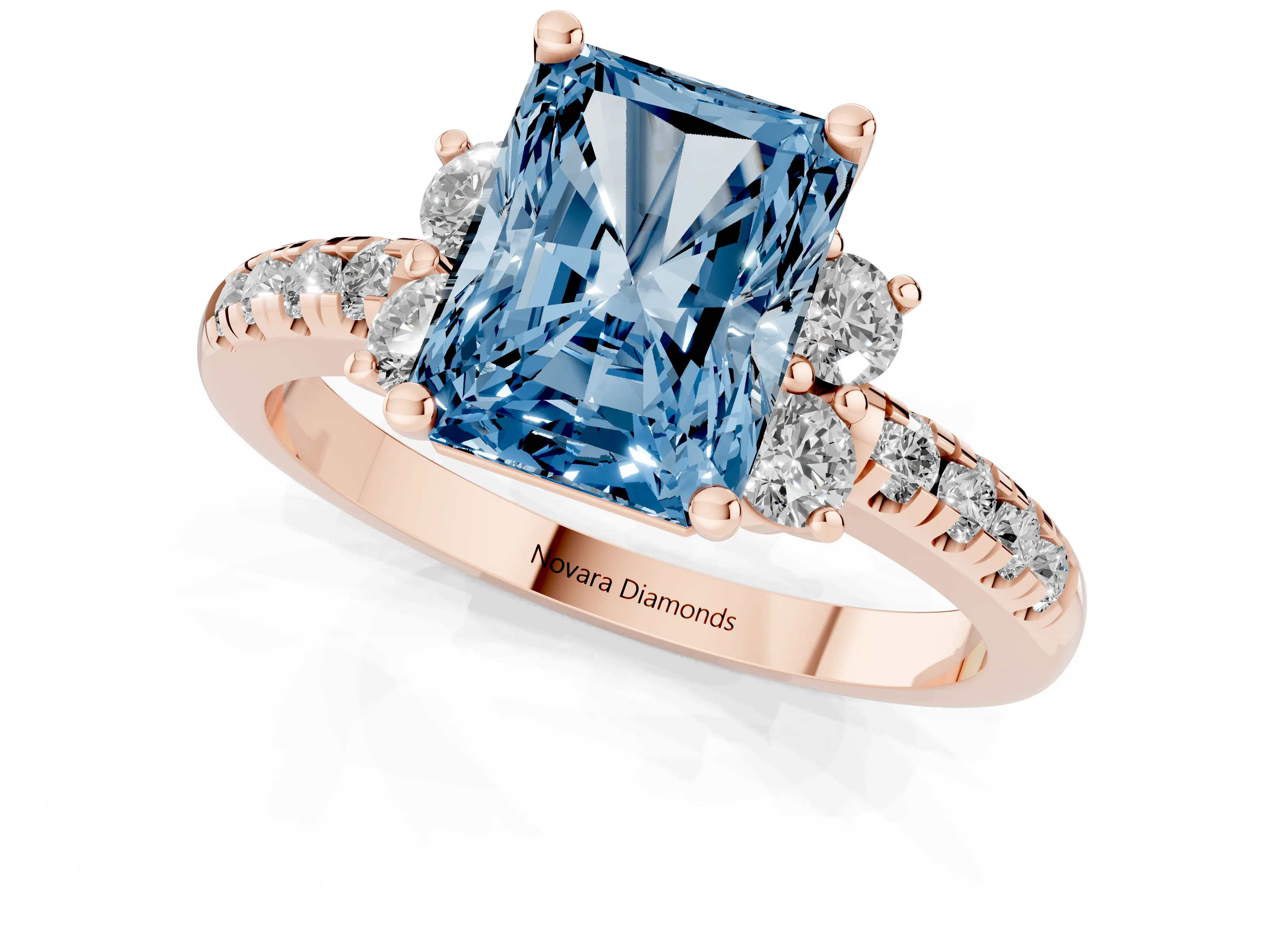 Fancy Blue Radiant Cut Diamond Three-Stone Pavé Ring Set in Rose gold with Prong Setting
