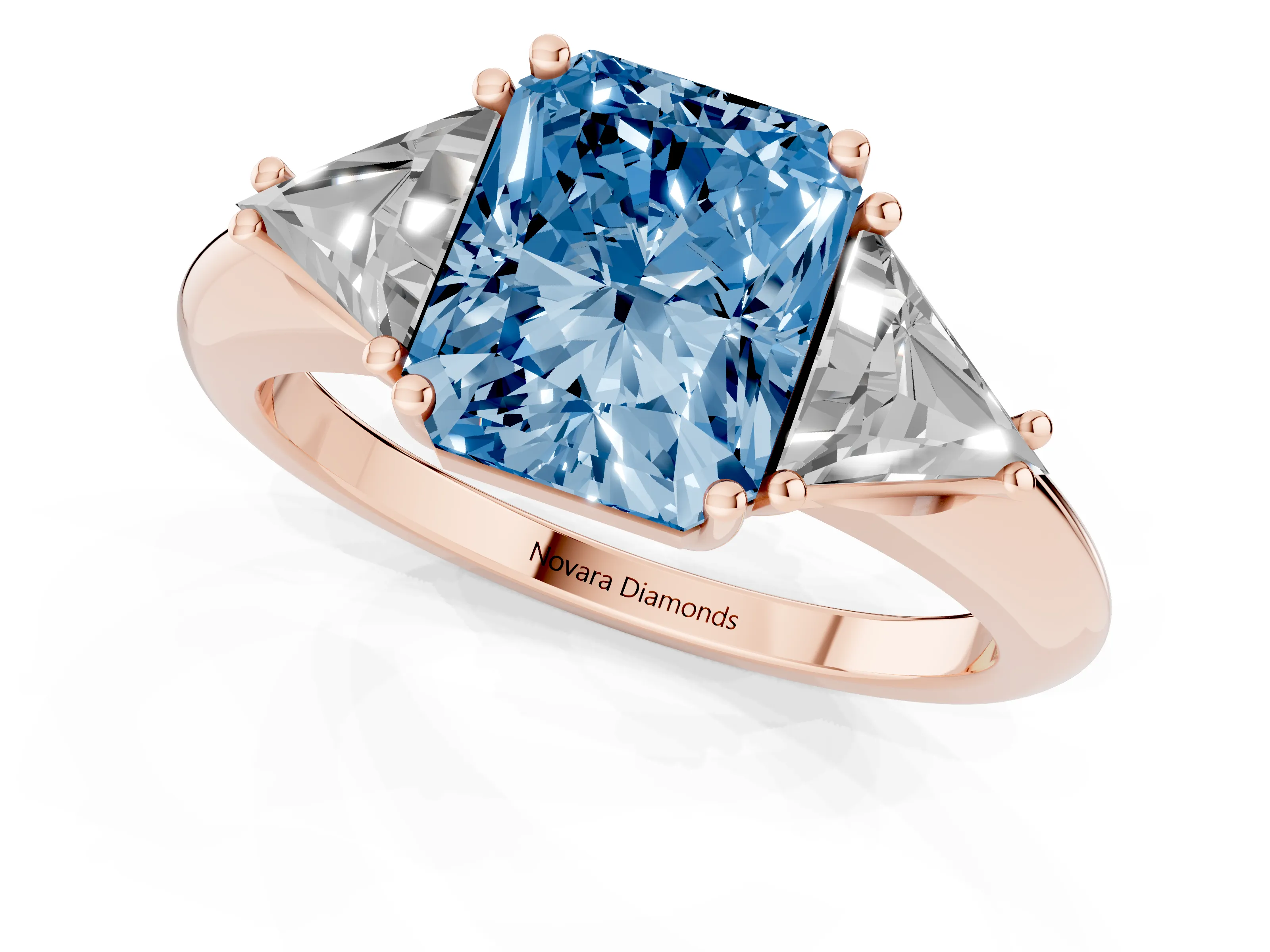 Fancy Blue Radiant Cut Diamond Three-Stone Engagement Ring Set in Rose gold with Trillion Side Stones