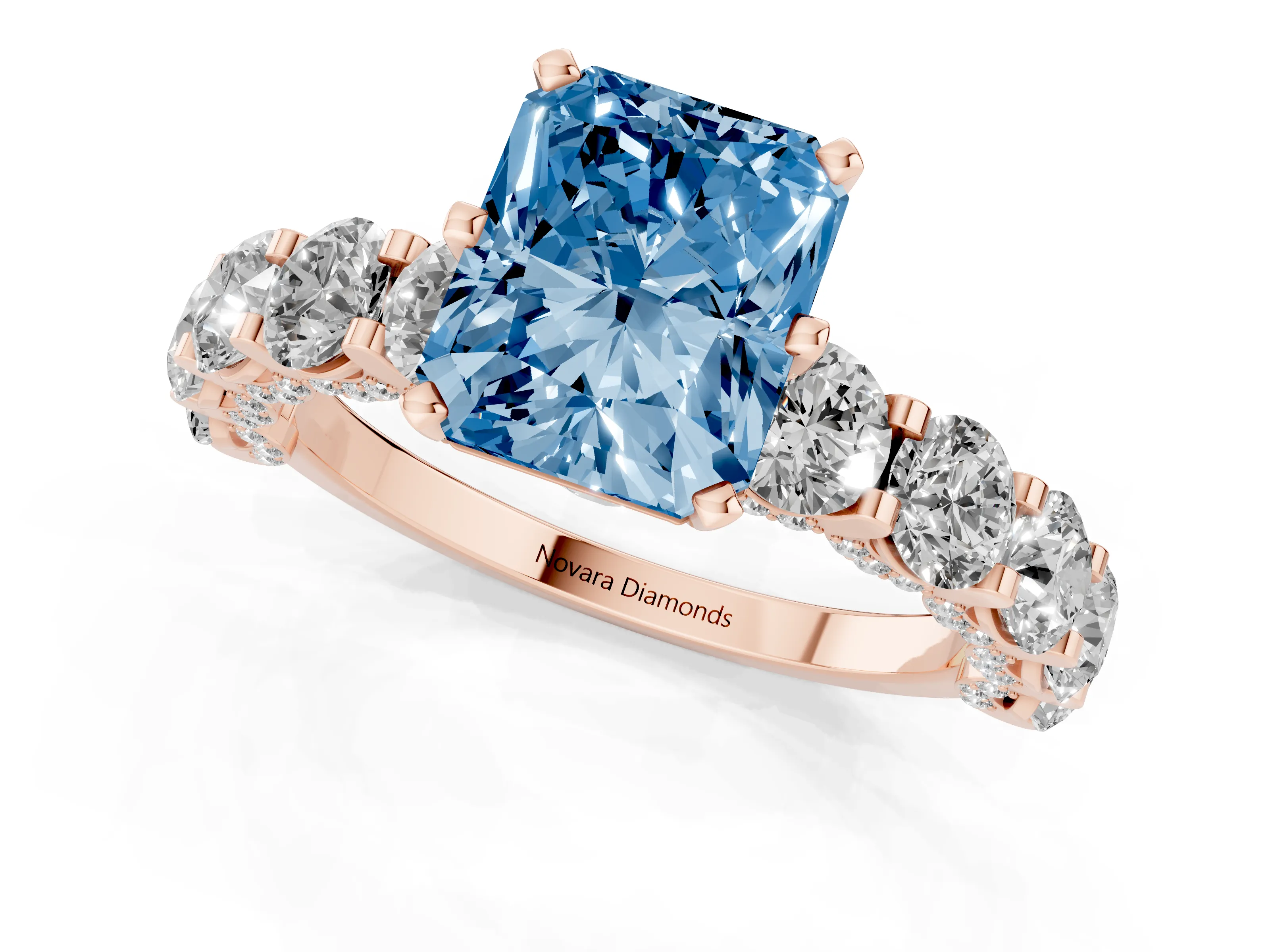 Fancy Blue Radiant Cut Diamond Side Stone Ring Set in Rose gold with Alternating Round and Oval Side Stones – second view