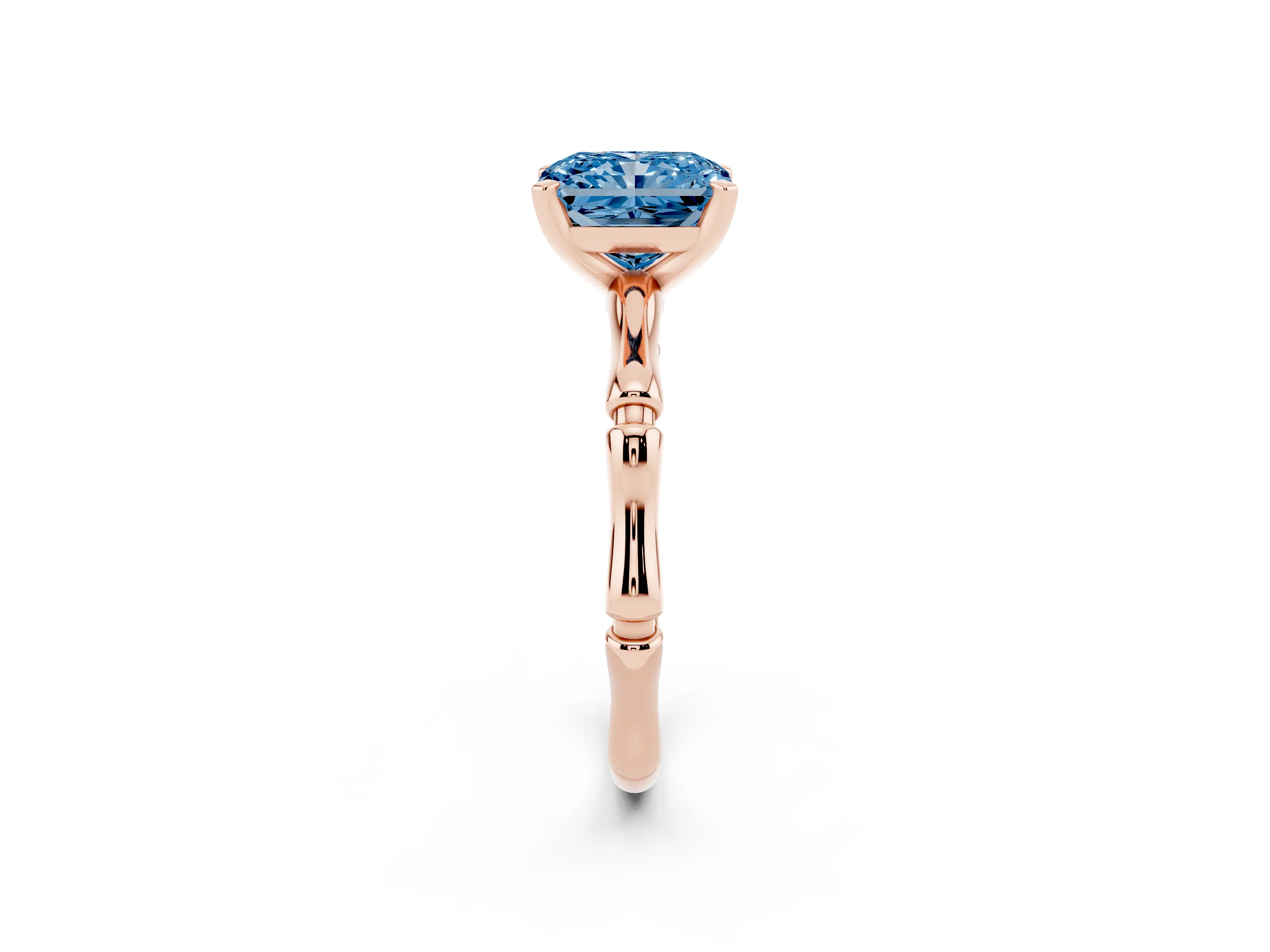 Fancy Blue Radiant Cut Diamond Solitaire Ring Set in Rose gold with Bamboo Band and Prong Setting
