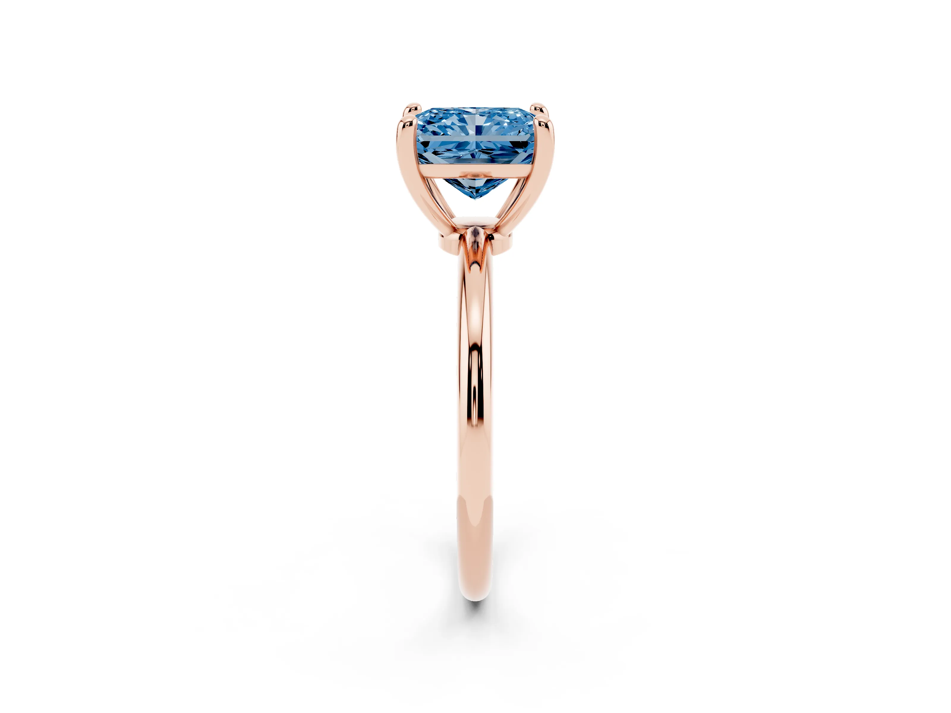 Fancy Blue Radiant Cut Diamond Solitaire Ring Set in Rose gold with Secure Prong Setting on a Classic Band