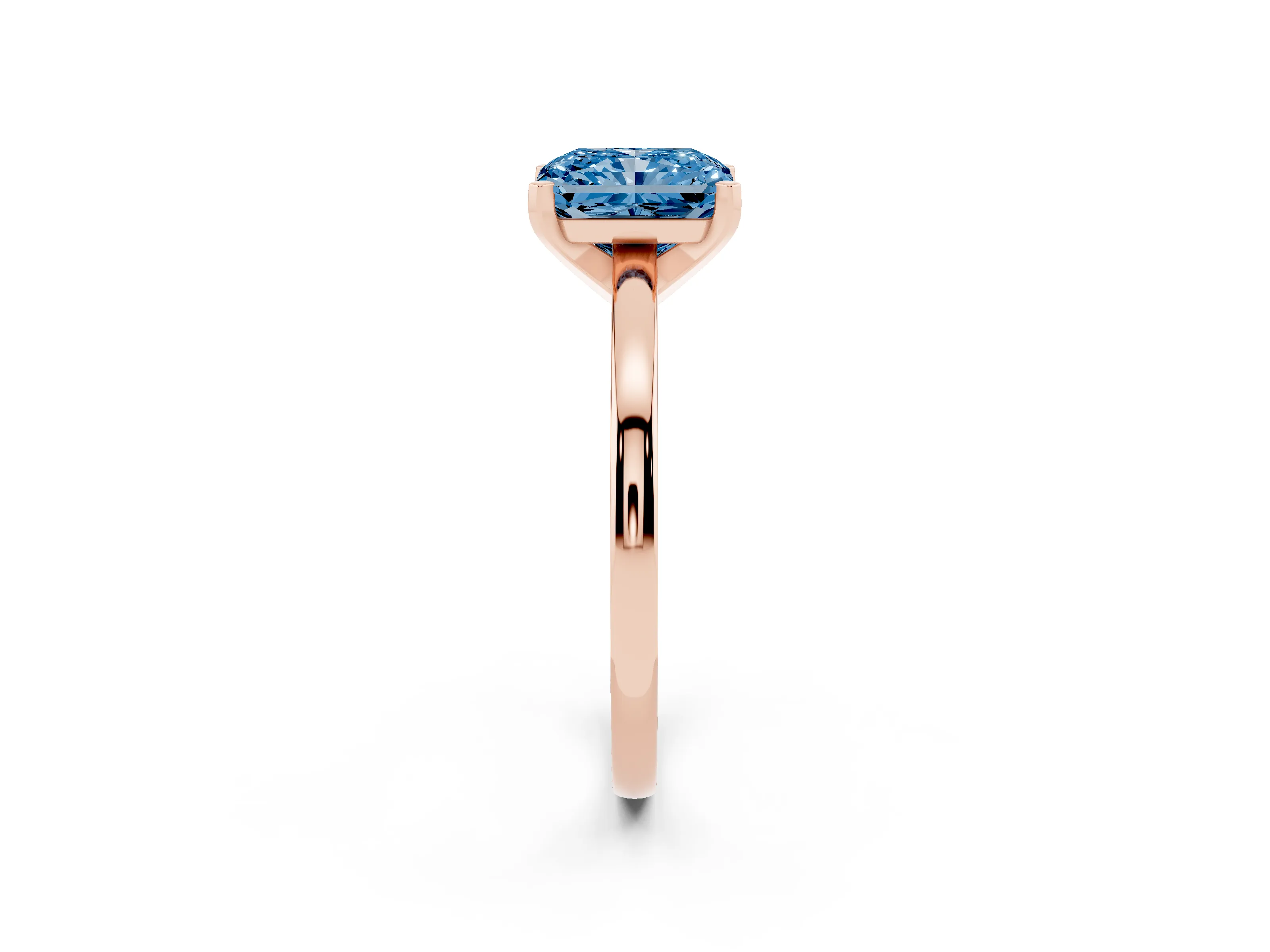 Fancy Blue Radiant Cut Diamond Solitaire Engagement Ring Set in Rose gold with Prong Setting on a Classic Band