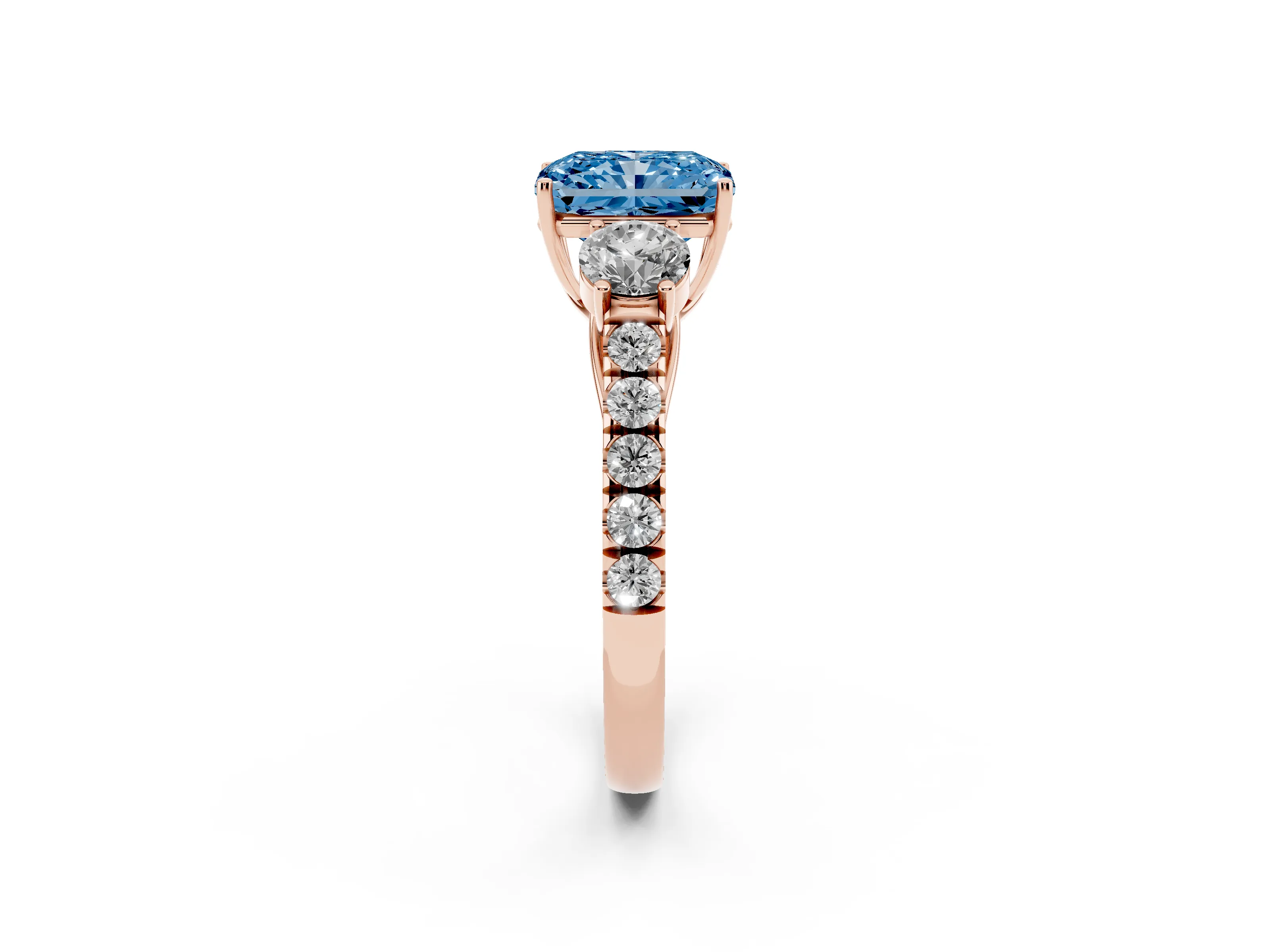 Fancy Blue Radiant Cut Diamond Three-Stone Ring Set in Rose gold with Round Side Stones and Delicate Pavé Band
