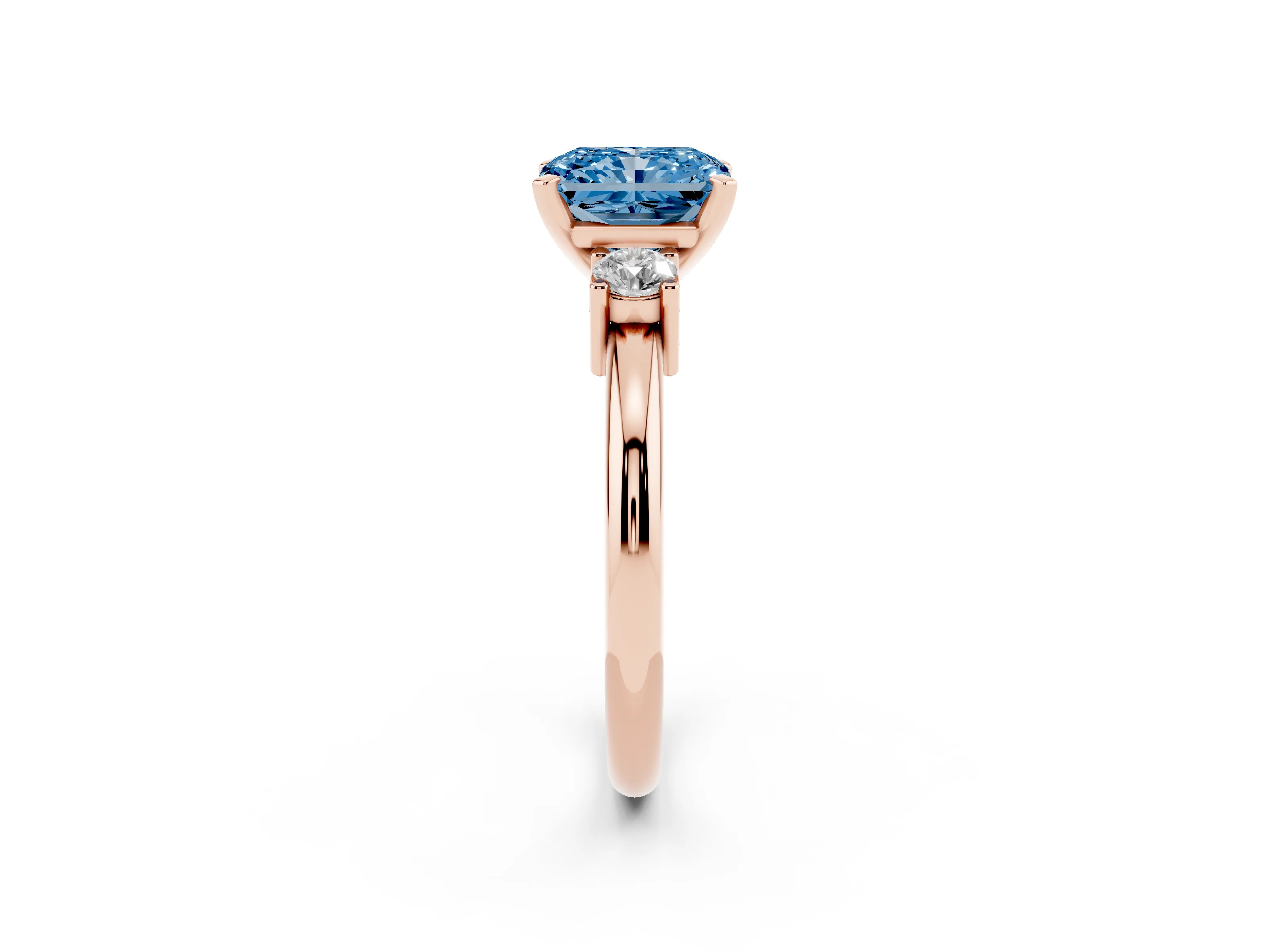 Fancy Blue Three-Stone Radiant Cut Diamond Ring Set in Rose gold with Prong Setting and Plain Band