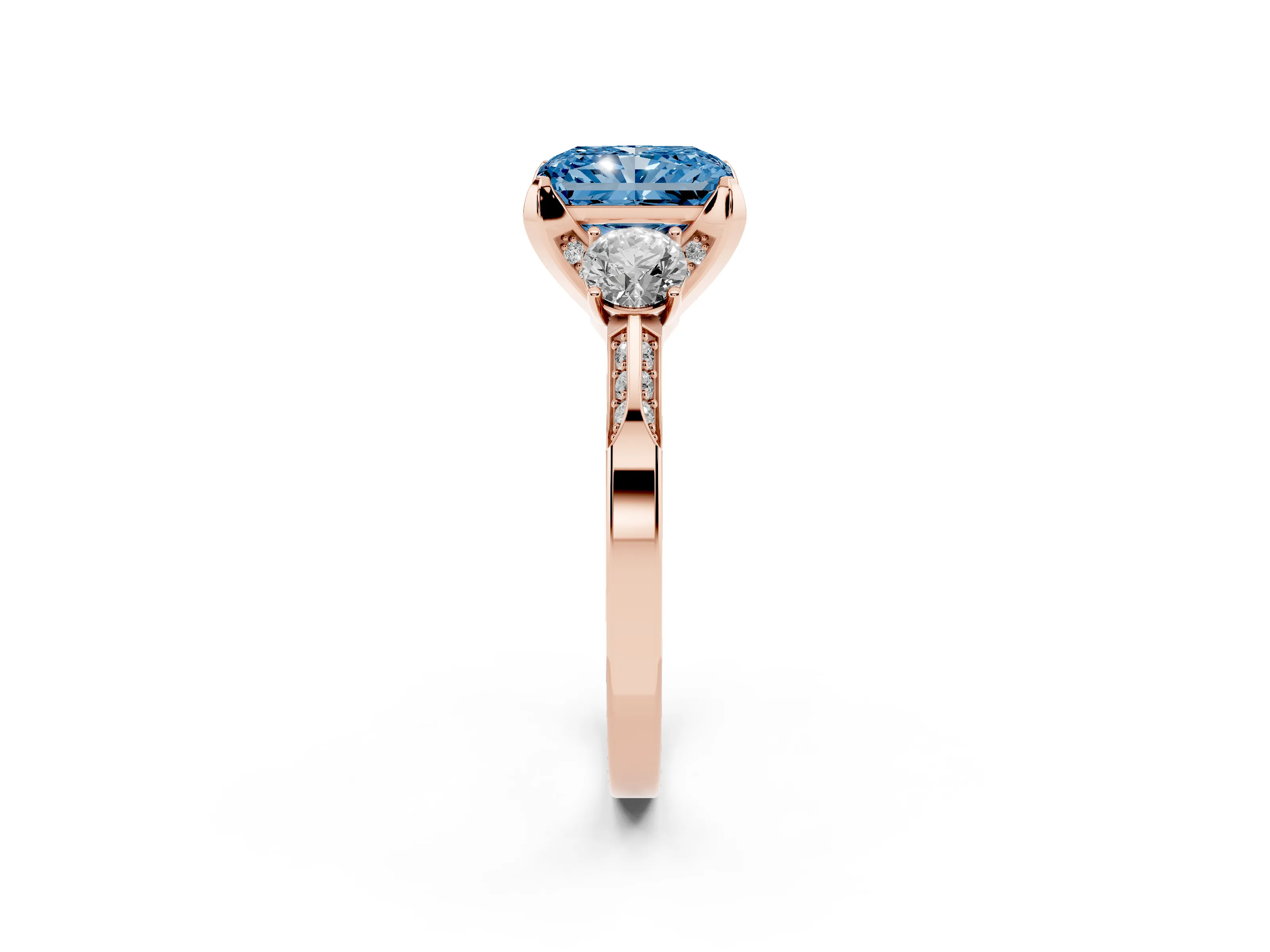 Fancy Blue Radiant Cut Diamond Three-Stone Ring Set in Rose gold with Pavé Band and Smaller Side Stones