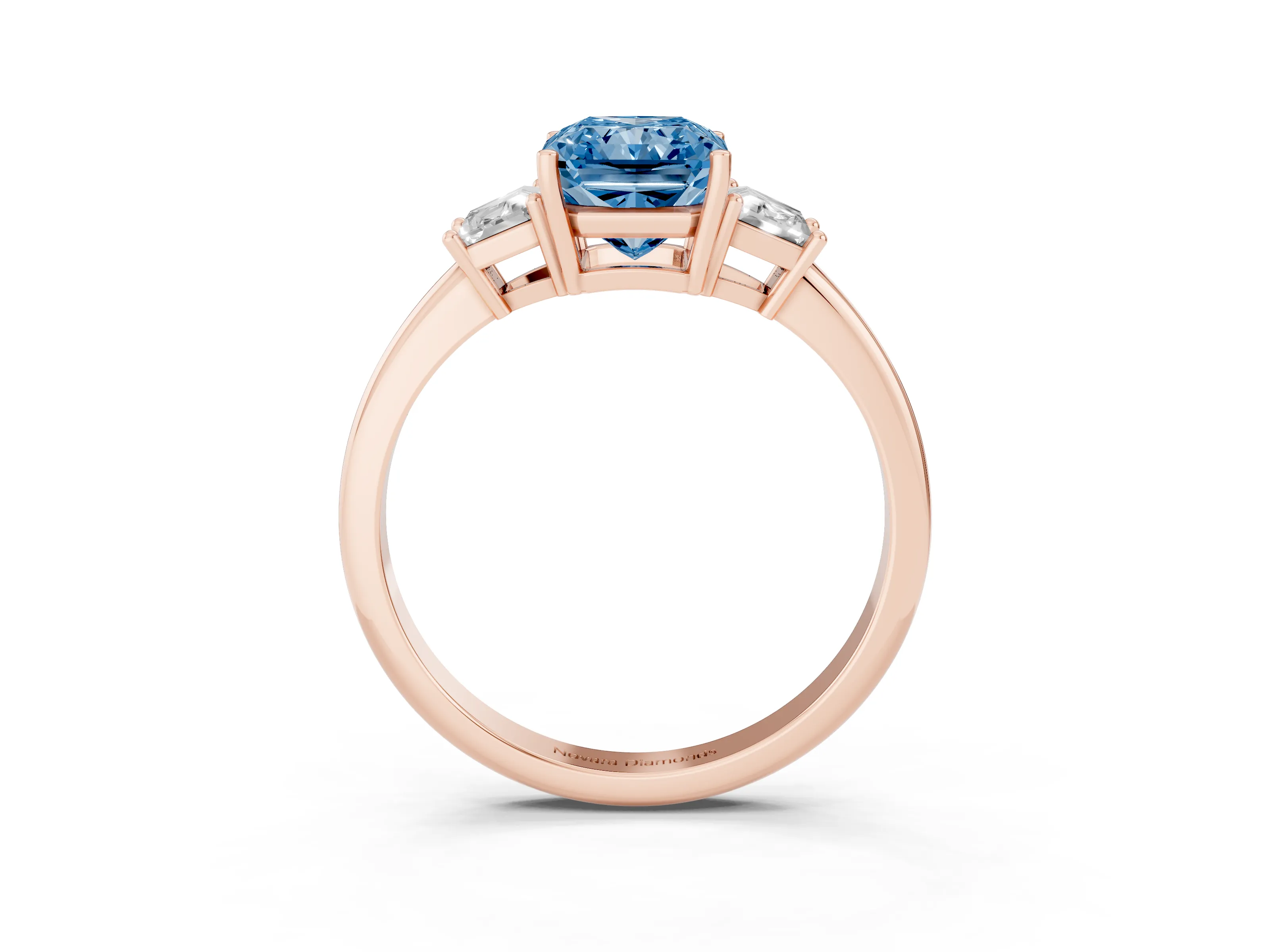 Fancy Blue Radiant Cut Diamond Three-Stone Ring Set in Rose gold with Trapezoid Side Stones and Prong Setting