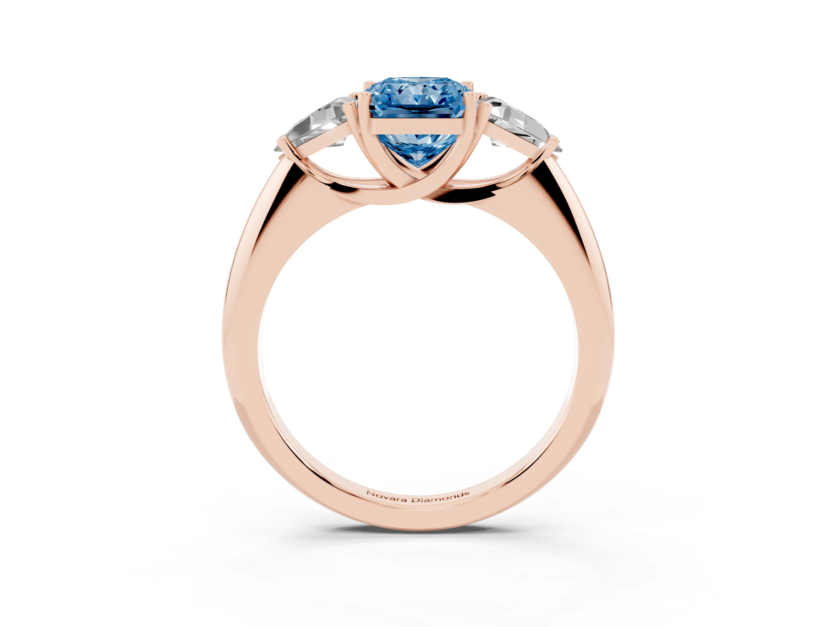 Fancy Blue Radiant Cut Diamond Three-Stone Engagement Ring Set in Rose gold with Trillion Side Stones