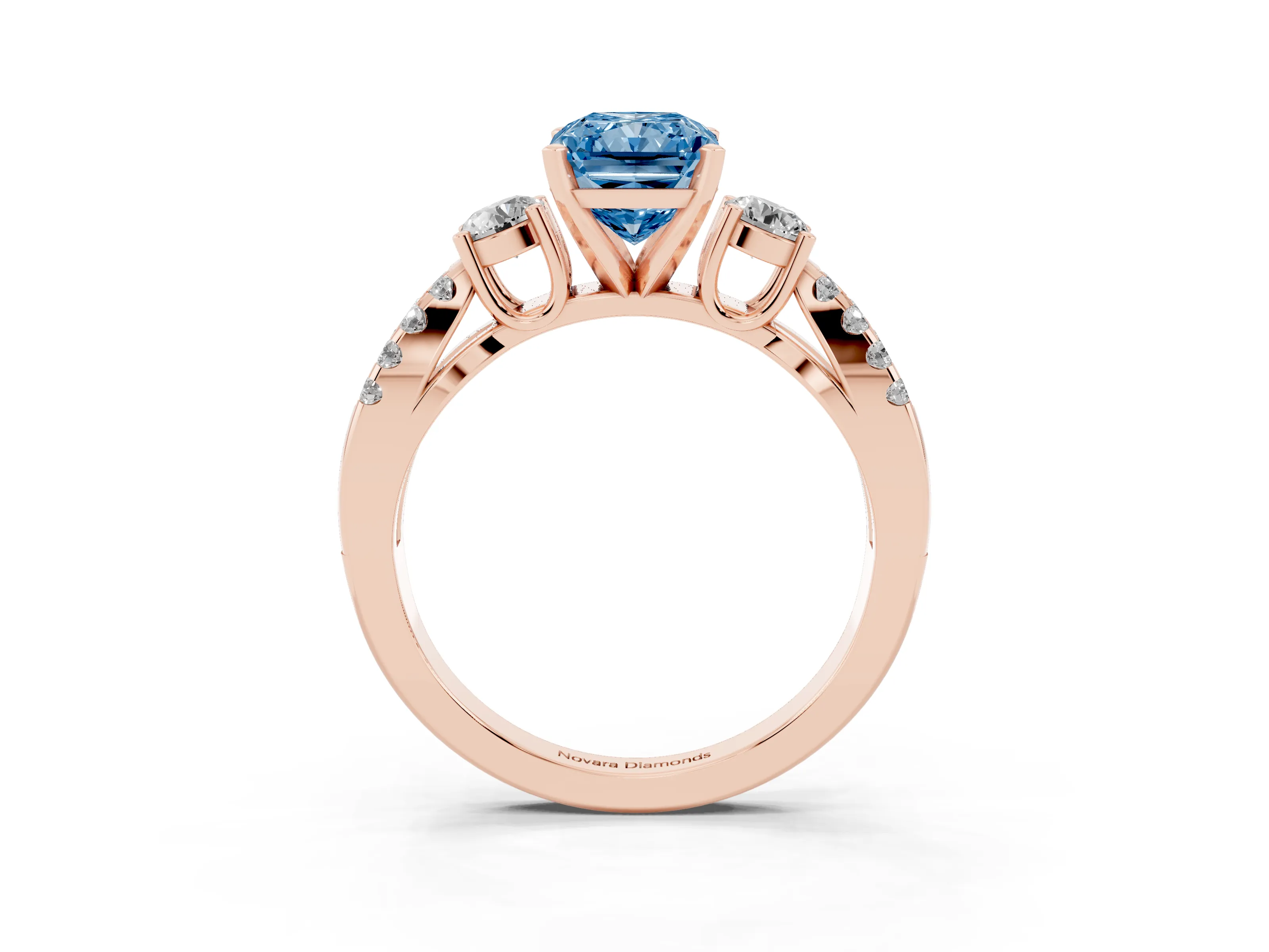 Fancy Blue Radiant Cut Diamond Three-Stone Ring Set in Rose gold with Pavé Split Shank and Prong Setting