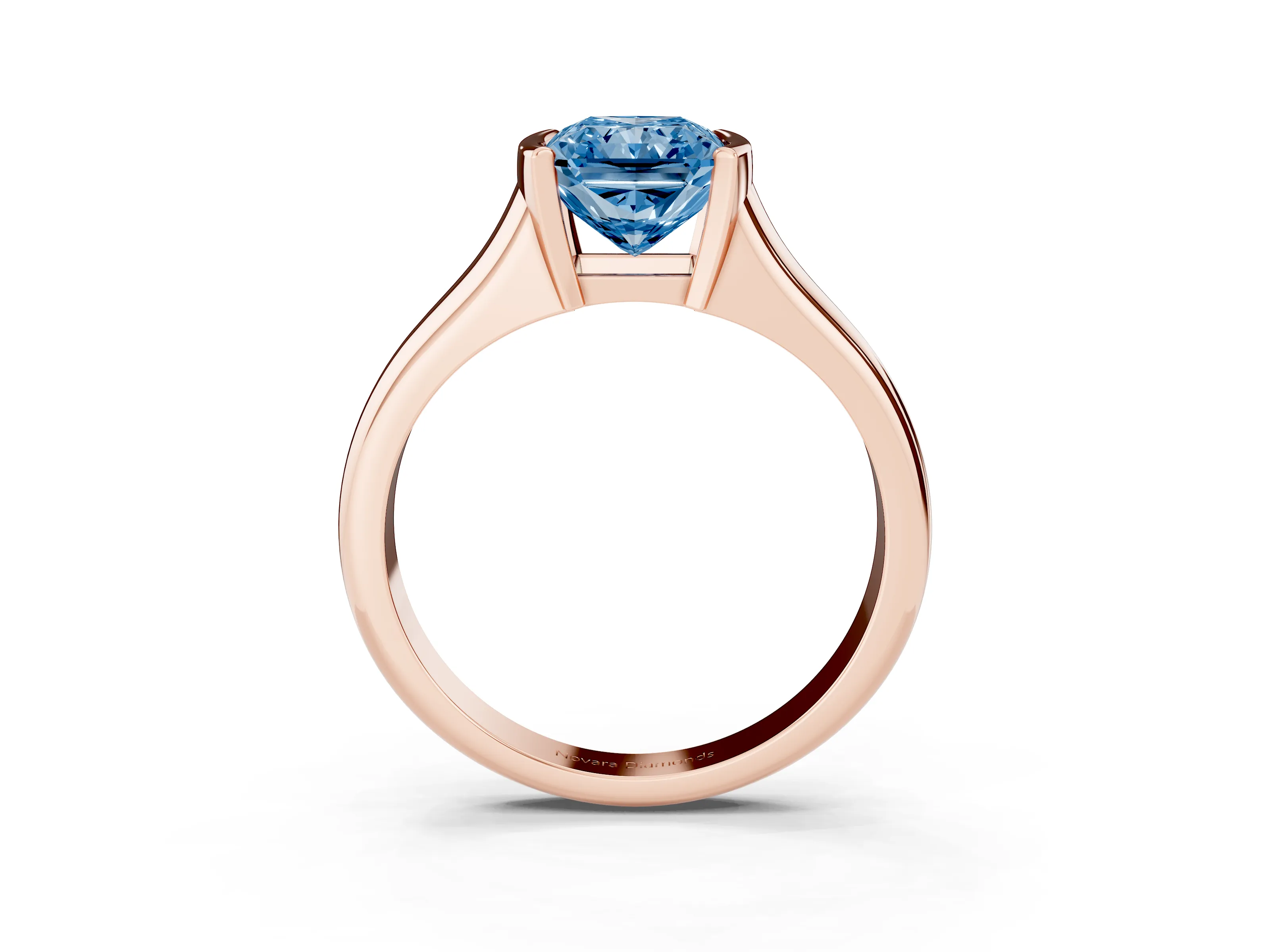 Fancy Blue Radiant Cut Diamond Solitaire Tension Set Ring Set in Rose gold with Split Shank Band